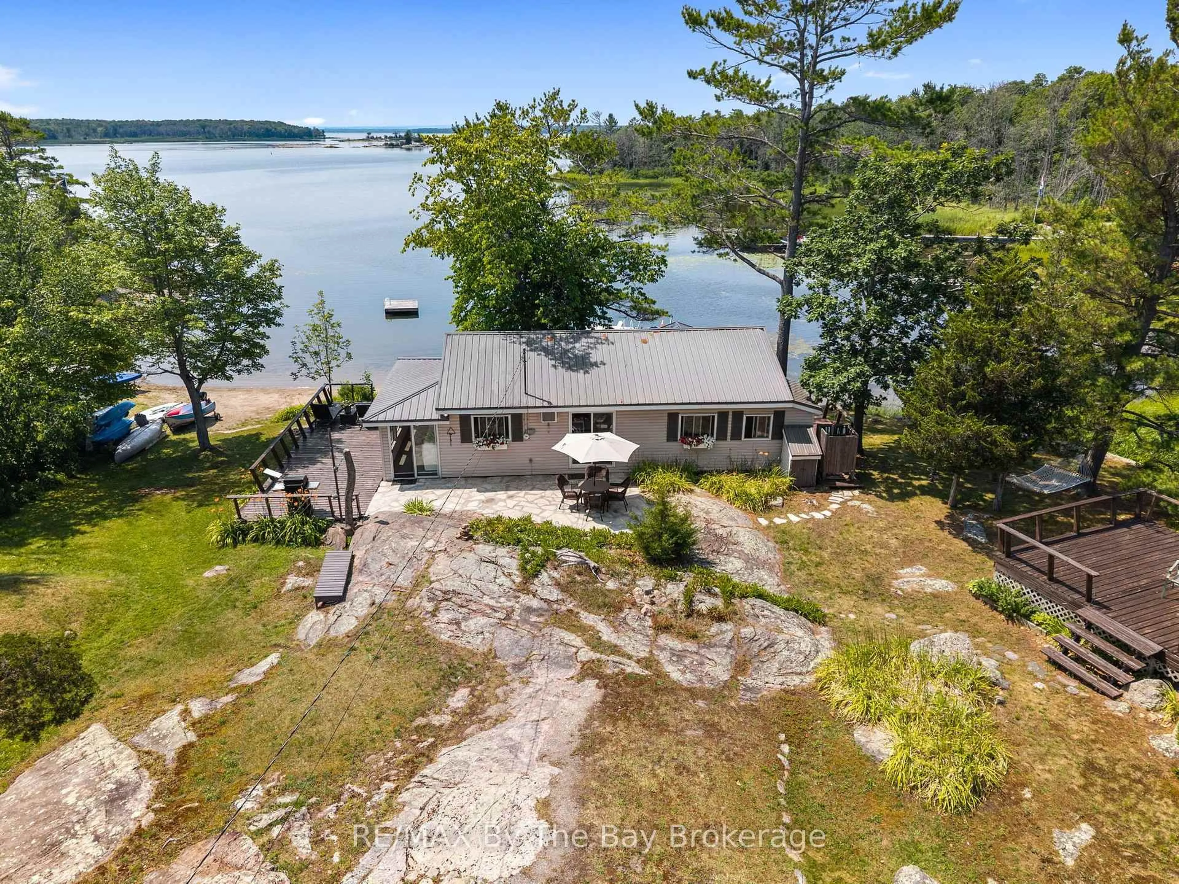 A pic from outside/outdoor area/front of a property/back of a property/a pic from drone, water/lake/river/ocean view for 294 Prisque Rd, Georgian Bay Ontario L0K 1S0