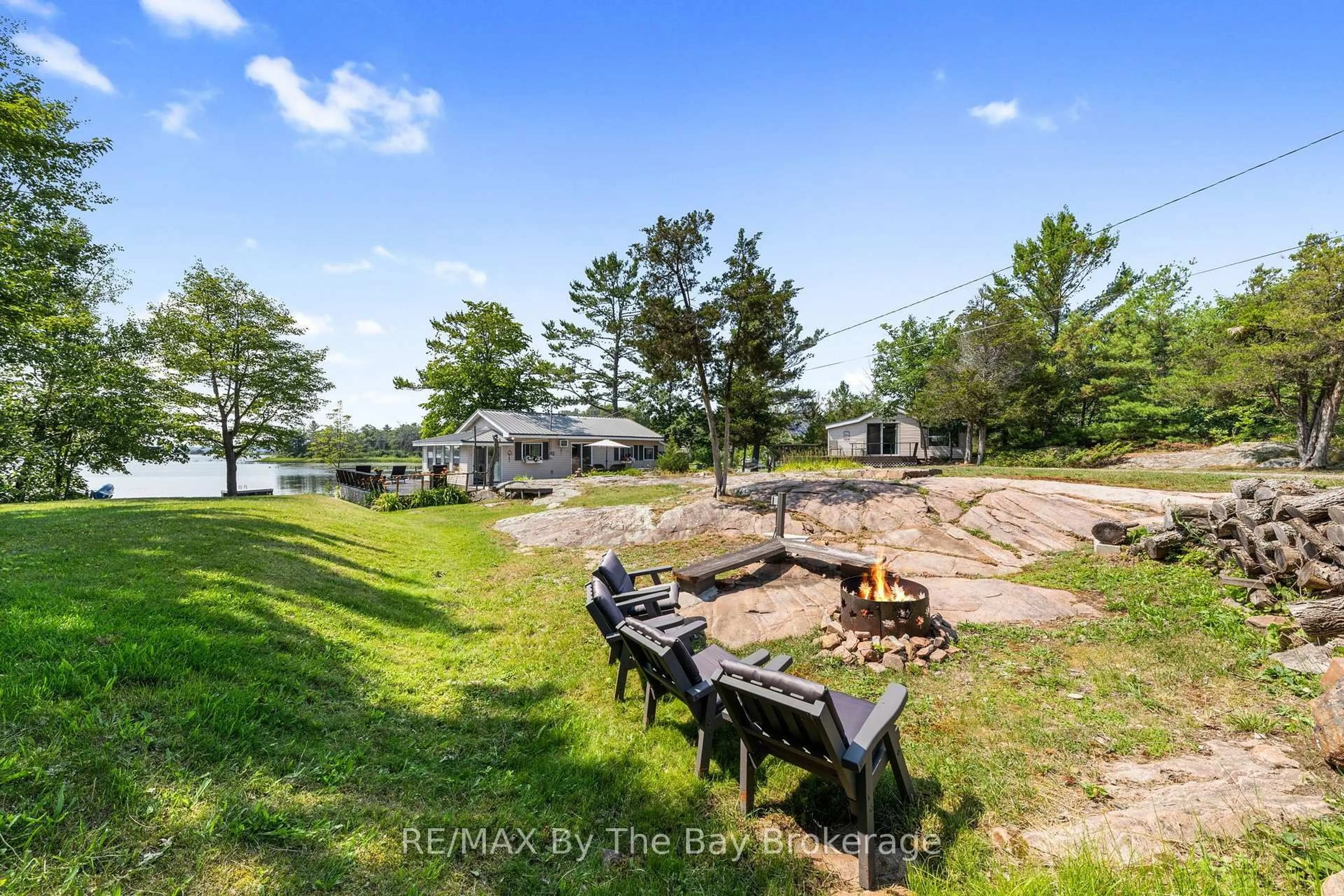 A pic from outside/outdoor area/front of a property/back of a property/a pic from drone, water/lake/river/ocean view for 294 Prisque Rd, Georgian Bay Ontario L0K 1S0