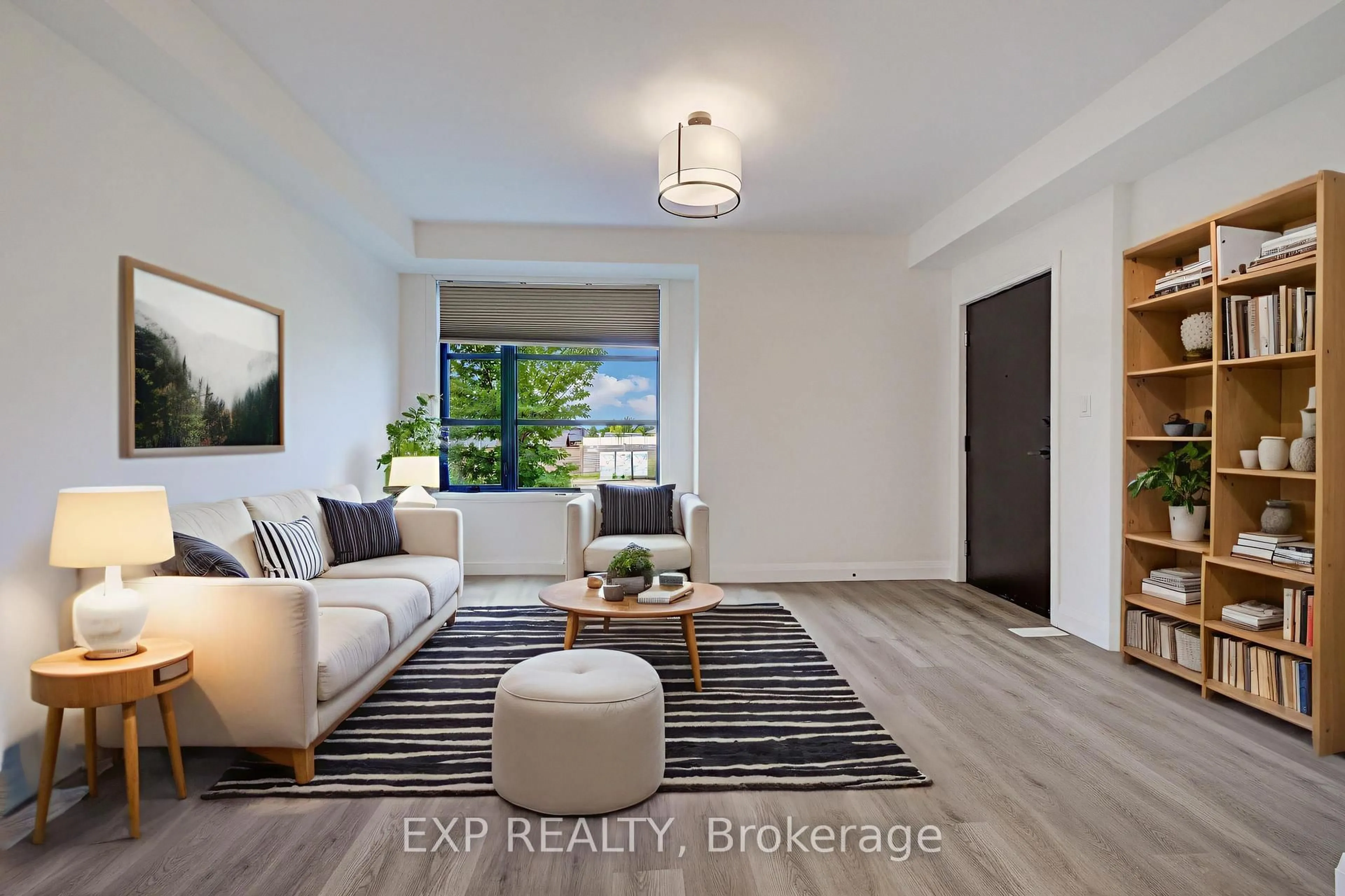 Living room with furniture, wood/laminate floor for 3900 Savoy St #15, London South Ontario N6P 0H9