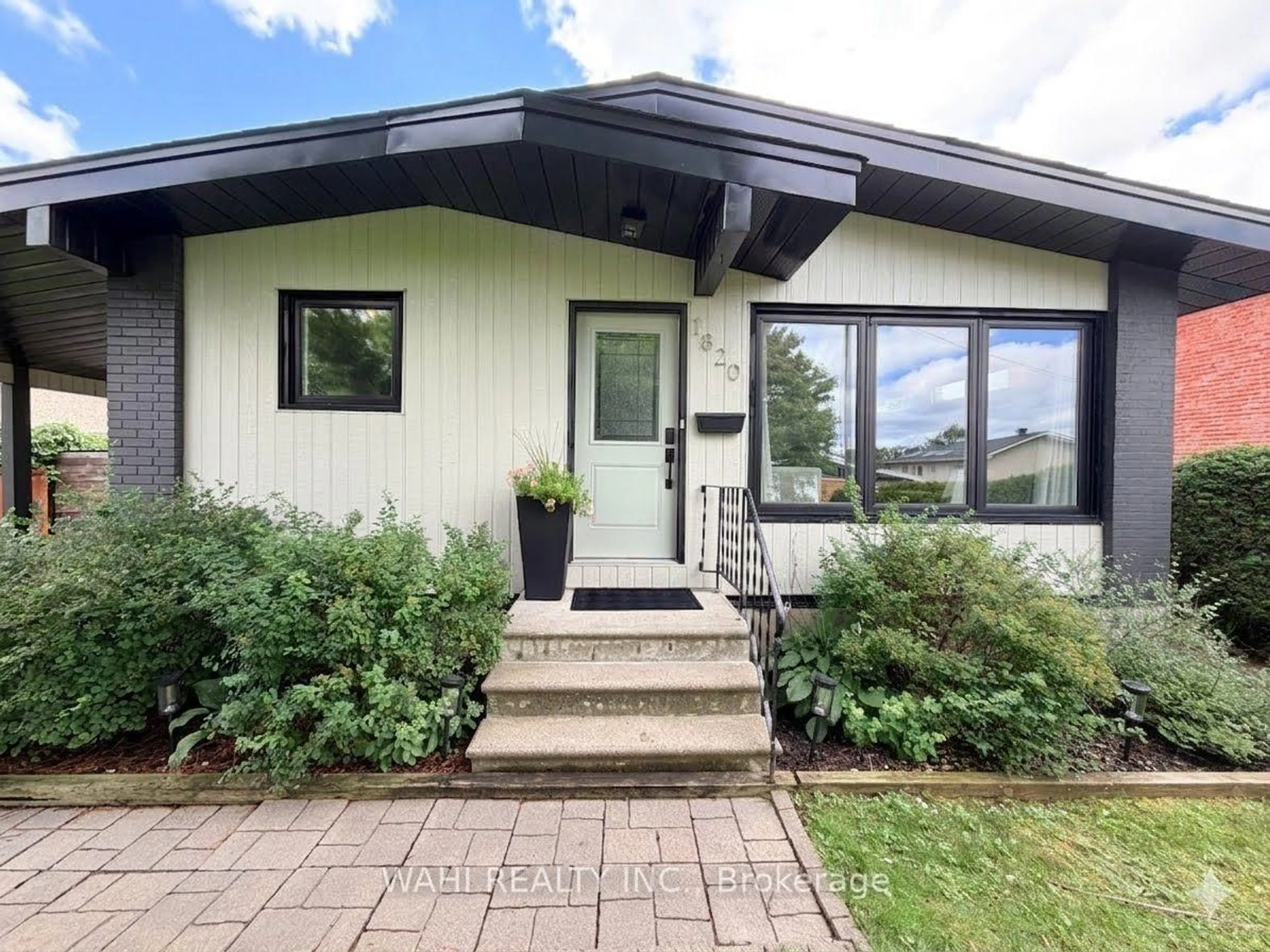 Home with vinyl exterior material, street for 1820 Lorraine Ave, Ottawa Ontario K1H 6Z8