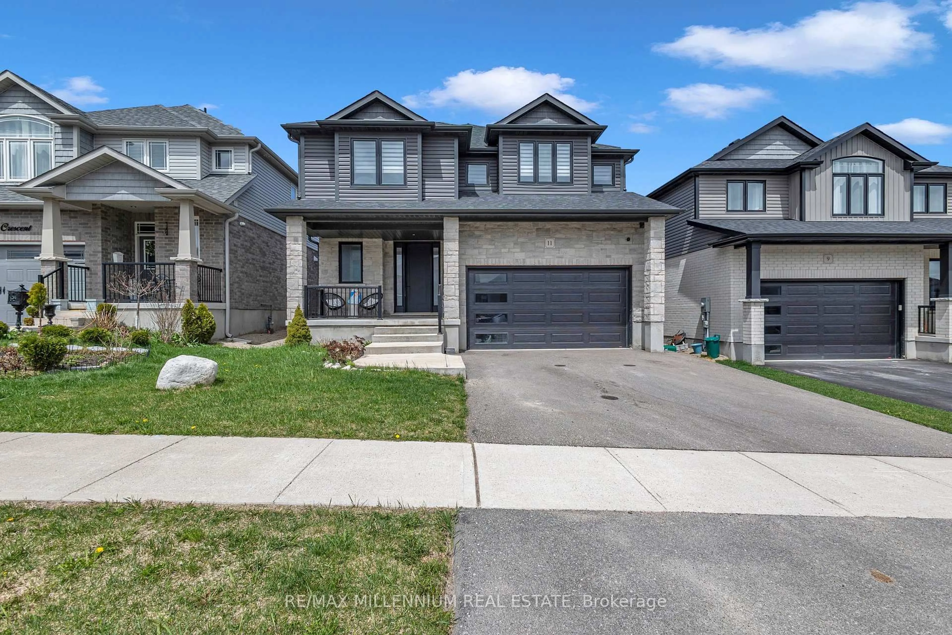 Home with brick exterior material, street for 11 Tindall Cres, East Luther Grand Valley Ontario L9W 6P4