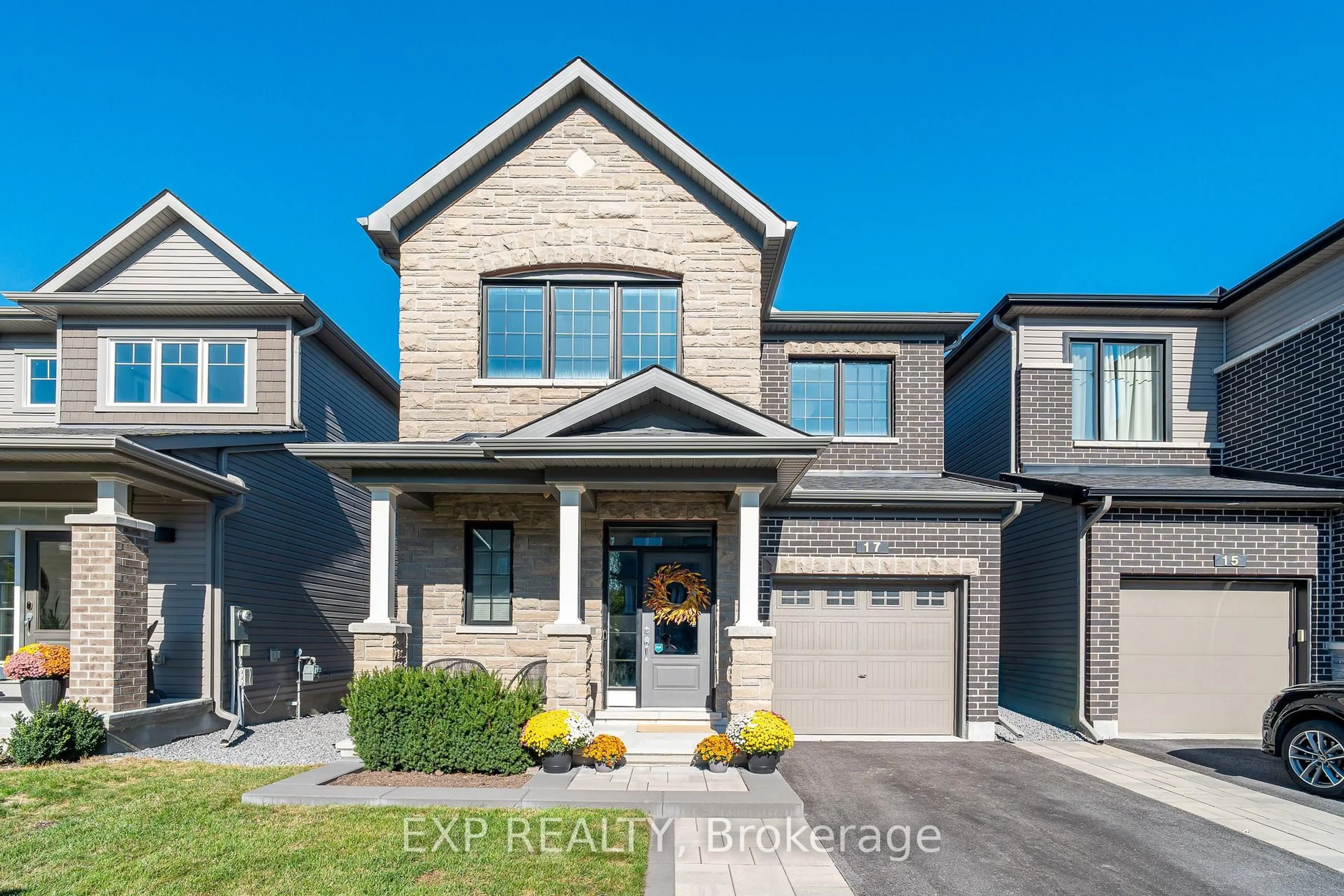 Home with brick exterior material, street for 17 Allan Moore Pl, Stittsville Ontario K2S 2A9