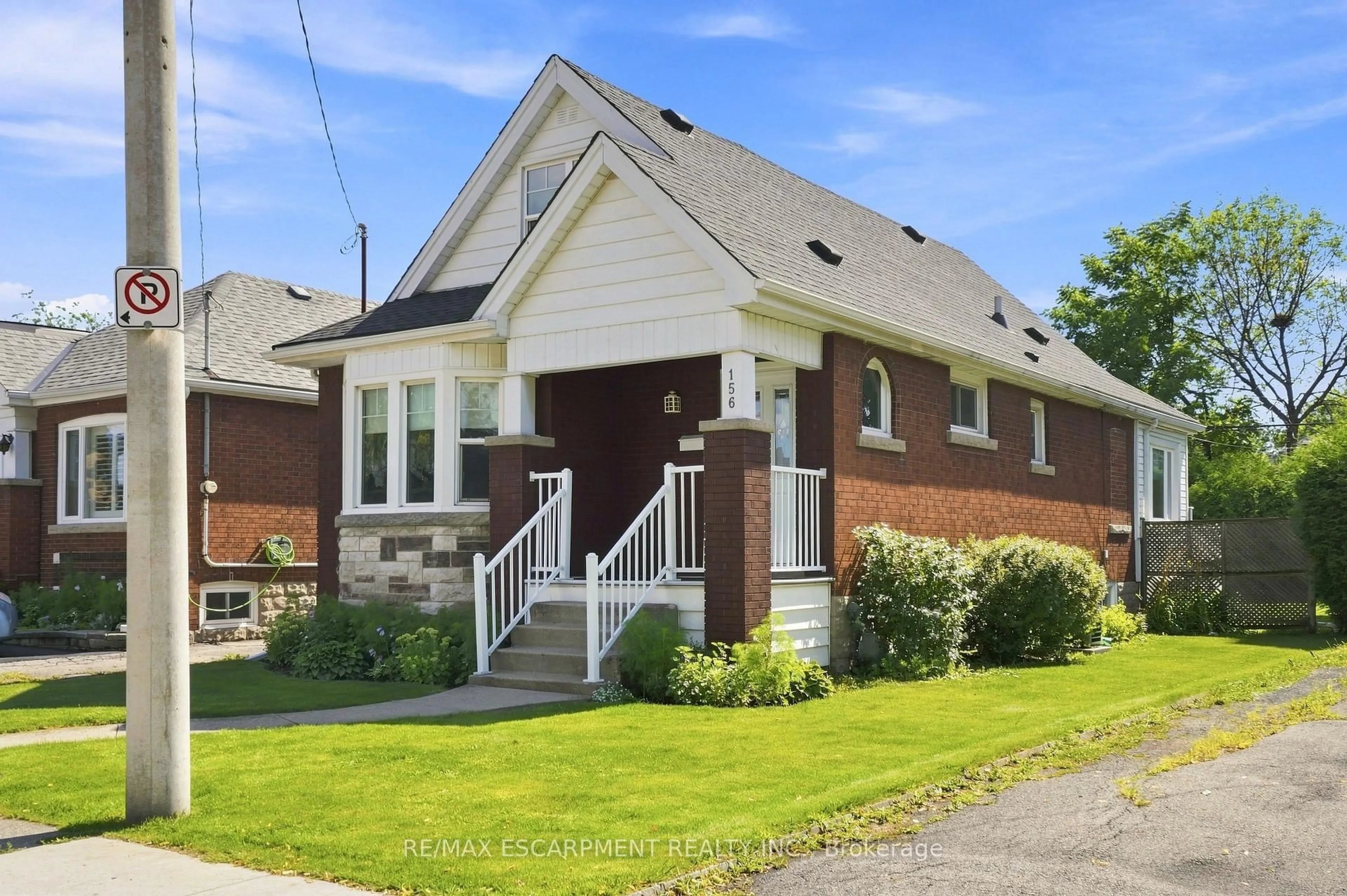 Home with brick exterior material, street for 156 Tragina Ave, Hamilton Ontario L8H 5C8