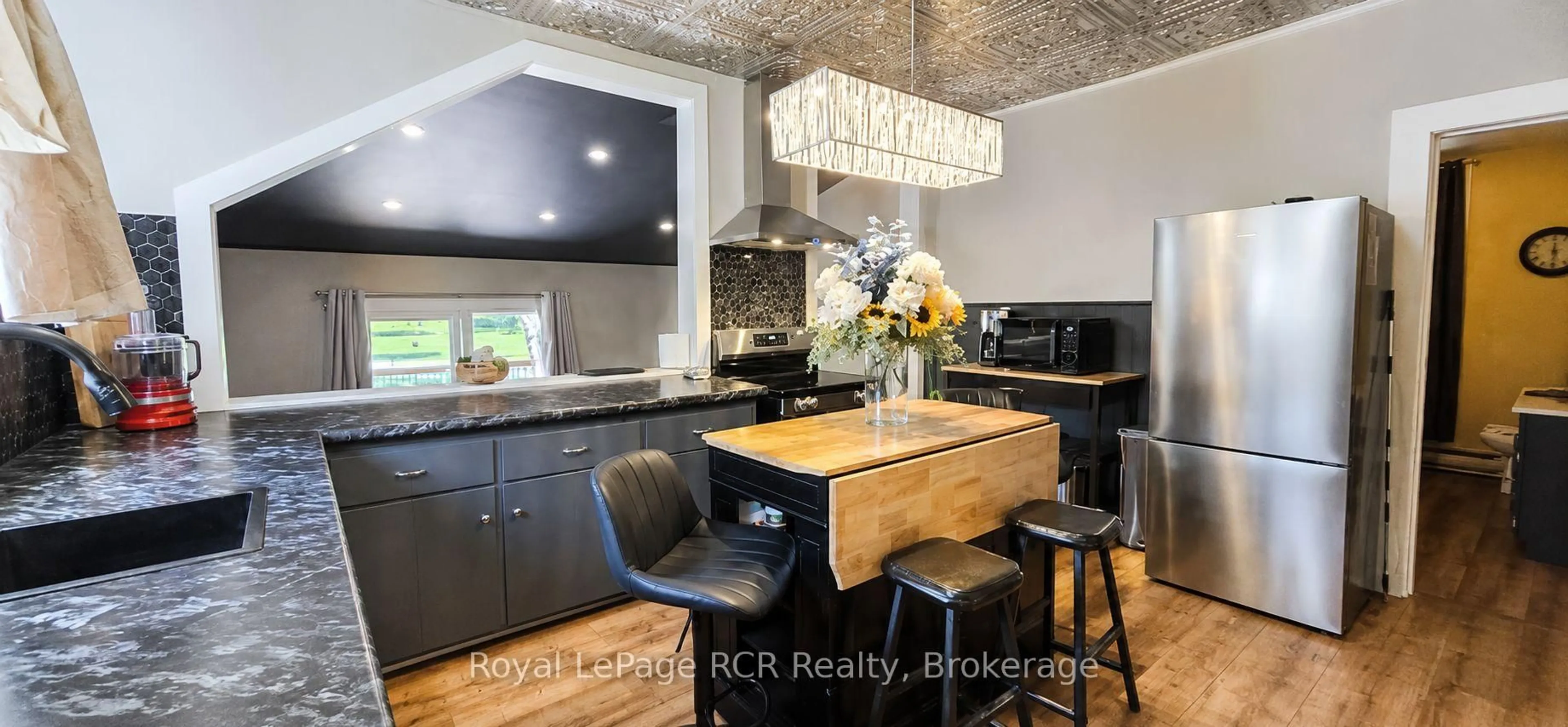 Open concept kitchen, wood/laminate floor for 526 Alice St, North Huron Ontario N0G 2W0
