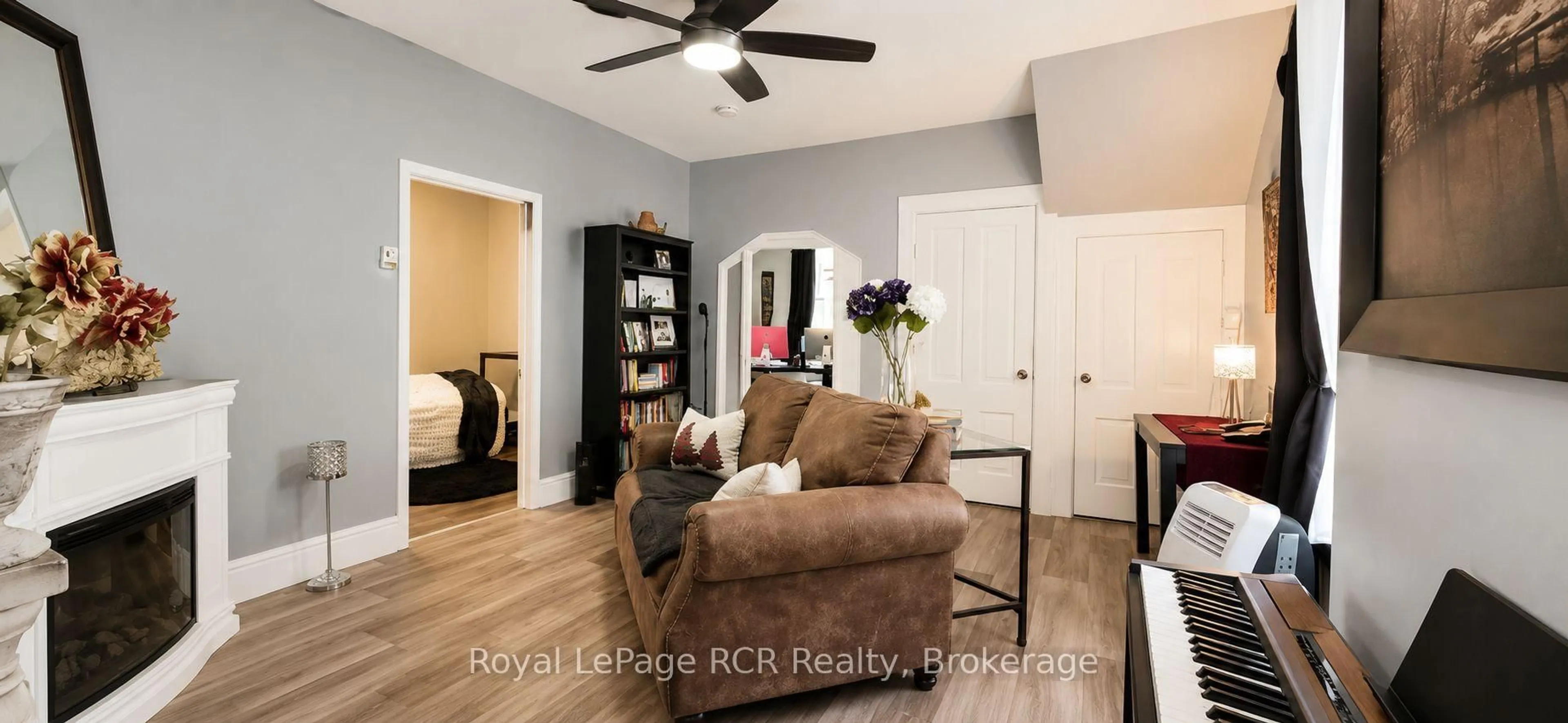 Living room with furniture, wood/laminate floor for 526 Alice St, North Huron Ontario N0G 2W0