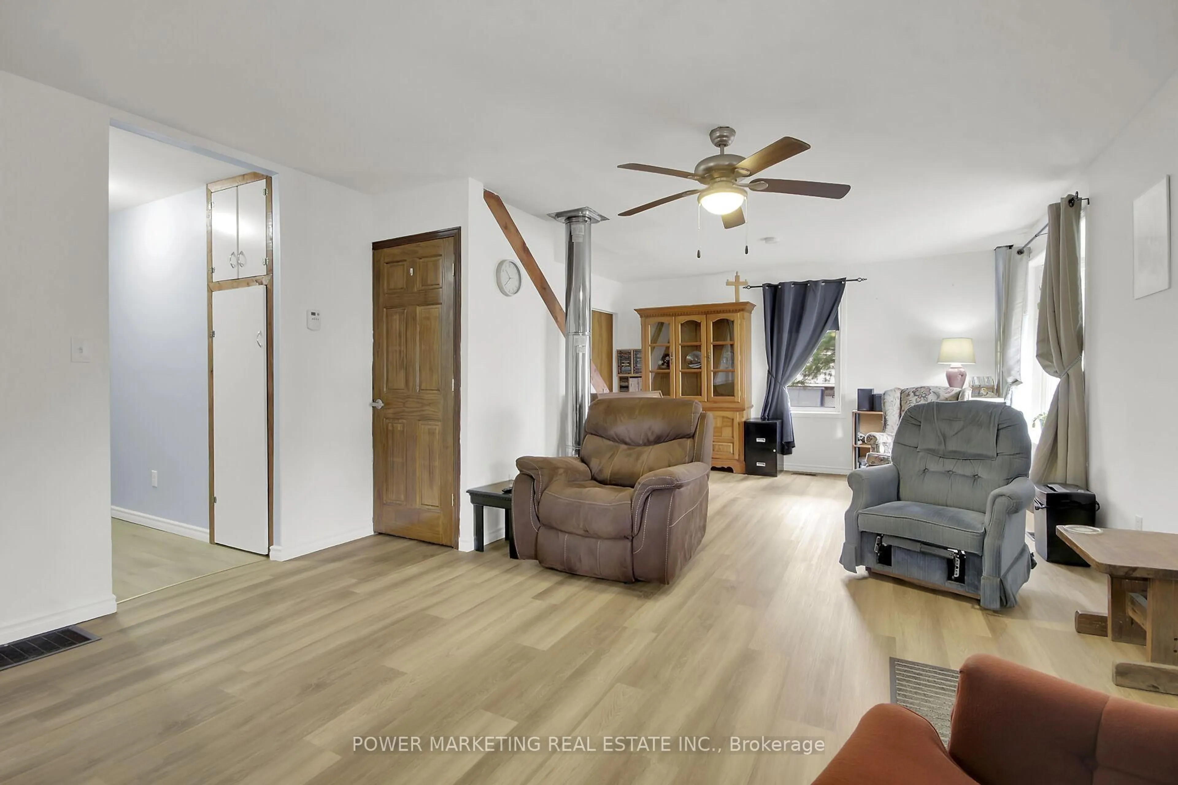 Living room with furniture, wood/laminate floor for 620 Highway 15 Highway, Rideau Lakes Ontario K0G 1L0