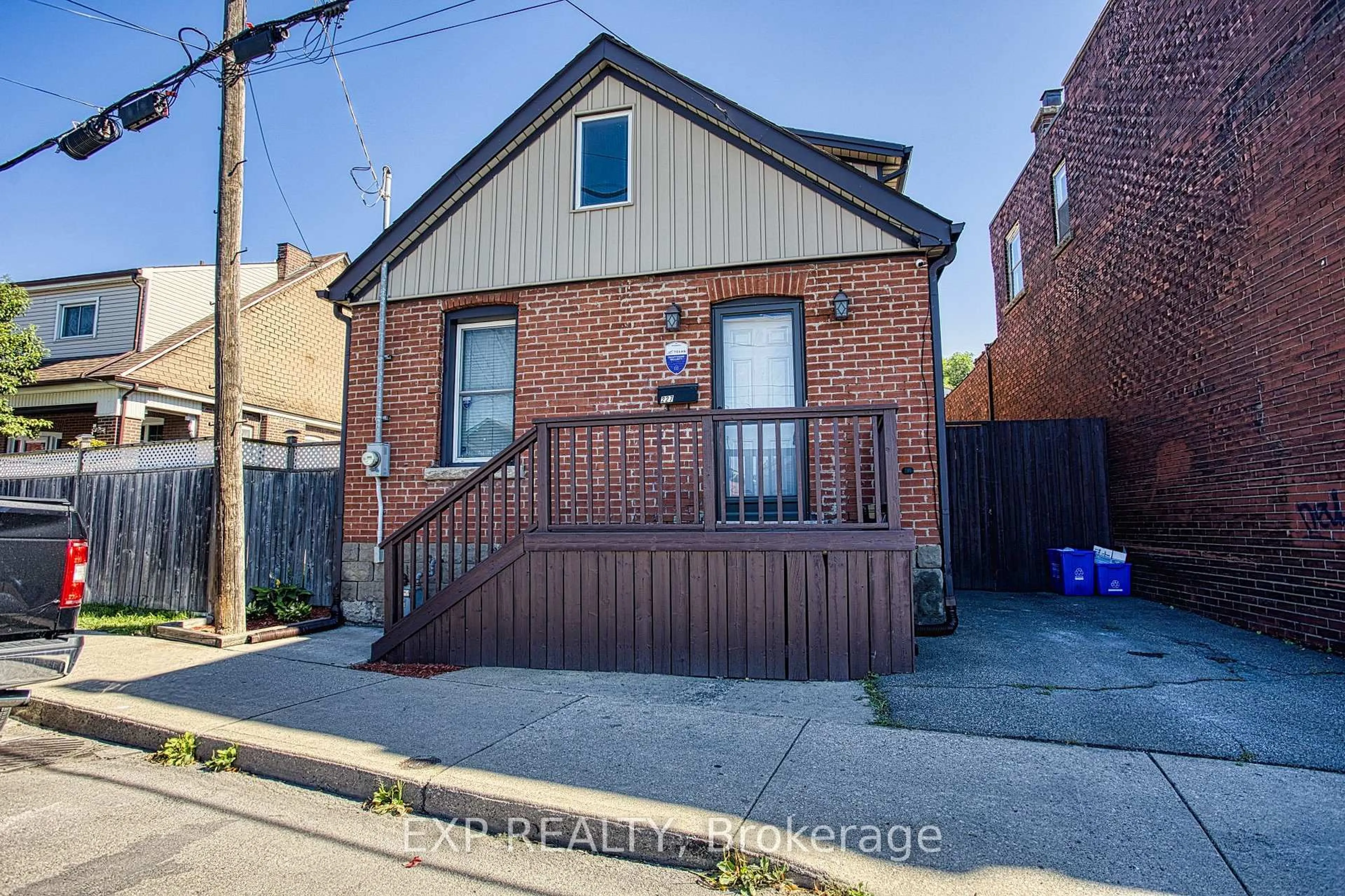 Home with brick exterior material, street for 227 Beach Rd, Hamilton Ontario L8L 4A9