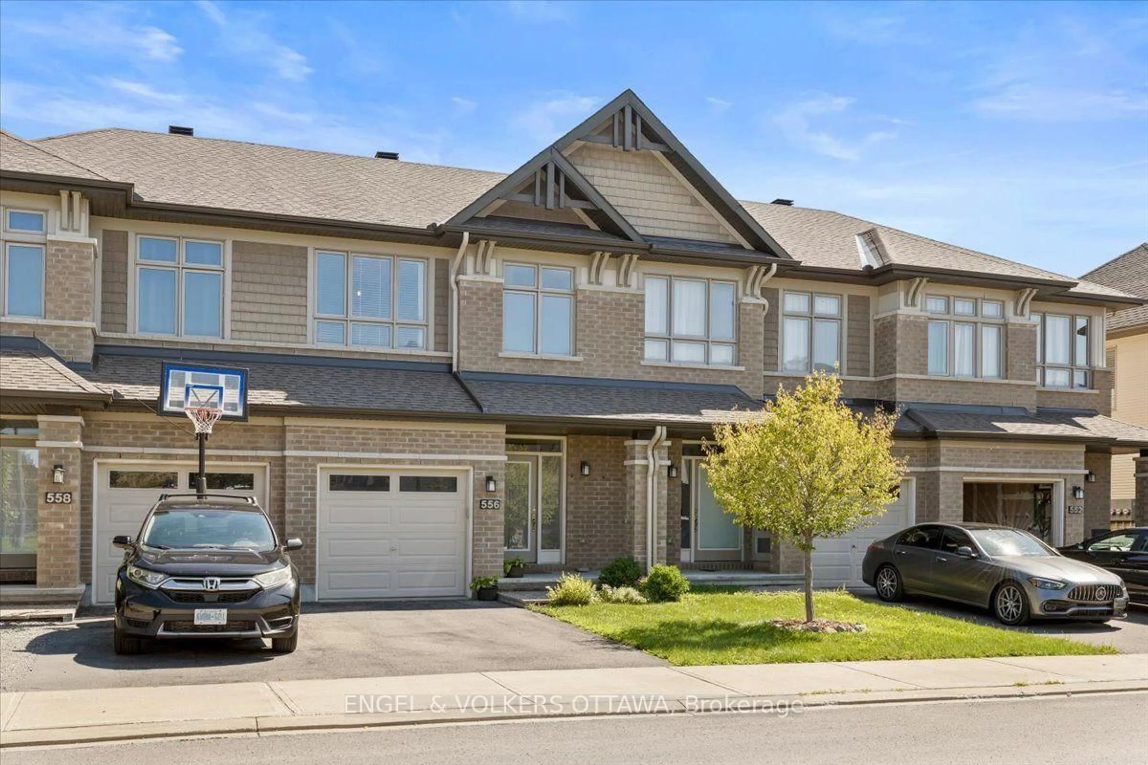 Home with vinyl exterior material, street for 556 Triangle St, Ottawa Ontario K2V 0M5