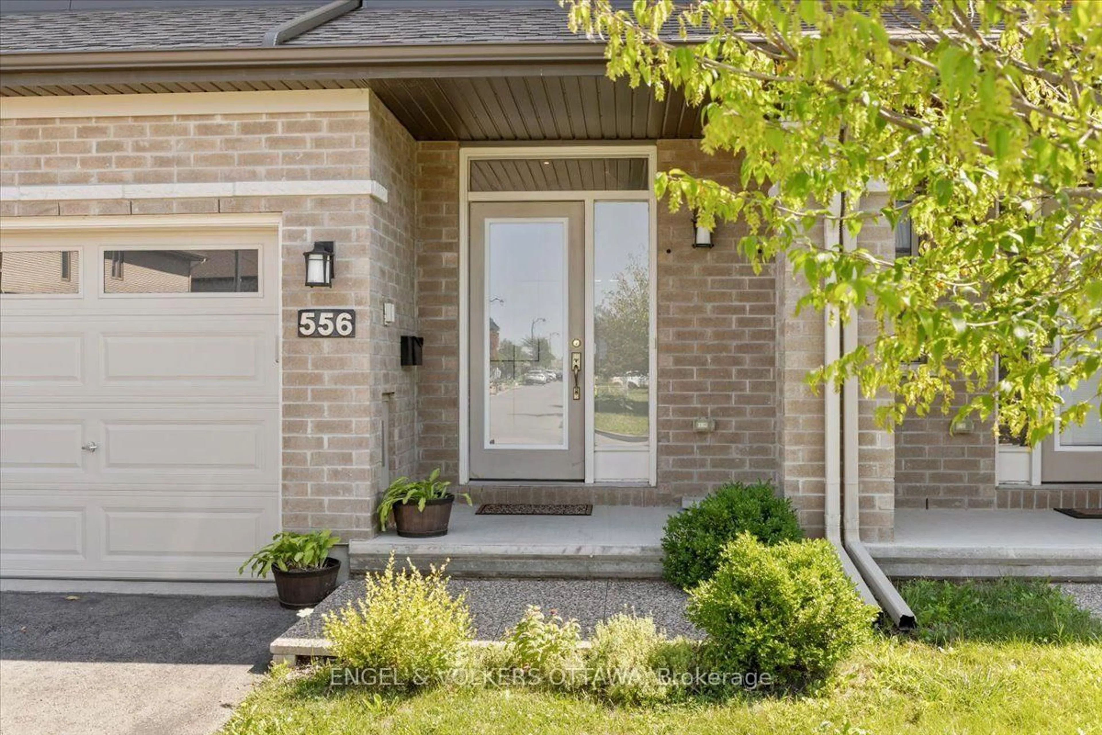 Home with brick exterior material, street for 556 Triangle St, Ottawa Ontario K2V 0M5