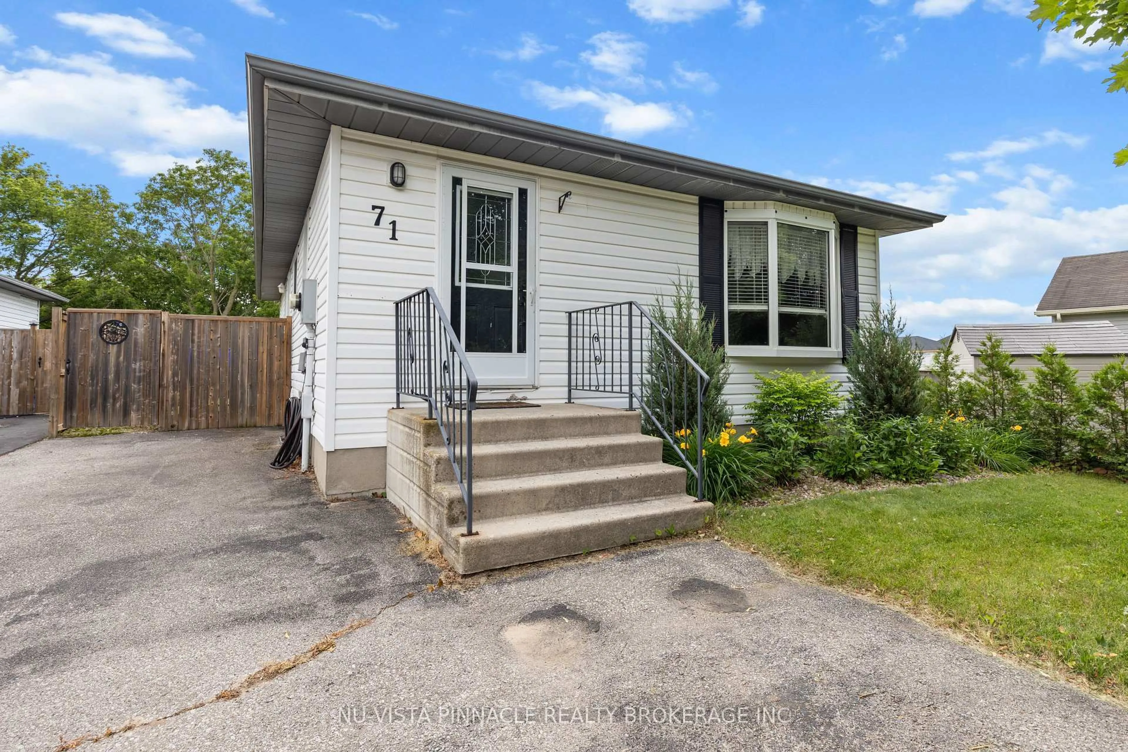 Home with vinyl exterior material, street for 71 Melanie Dr, Aylmer Ontario N5H 3G5