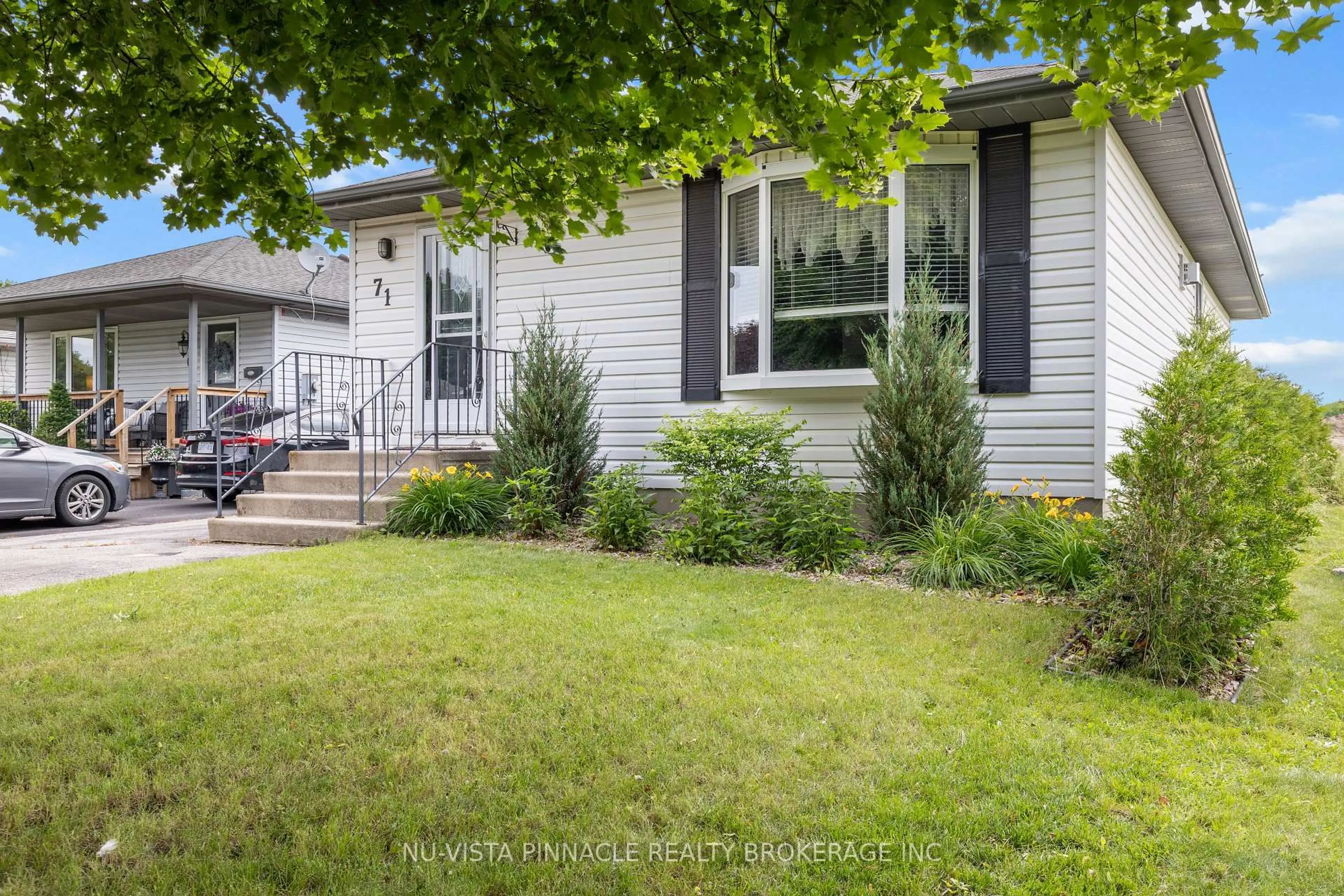 Home with vinyl exterior material, street for 71 Melanie Dr, Aylmer Ontario N5H 3G5