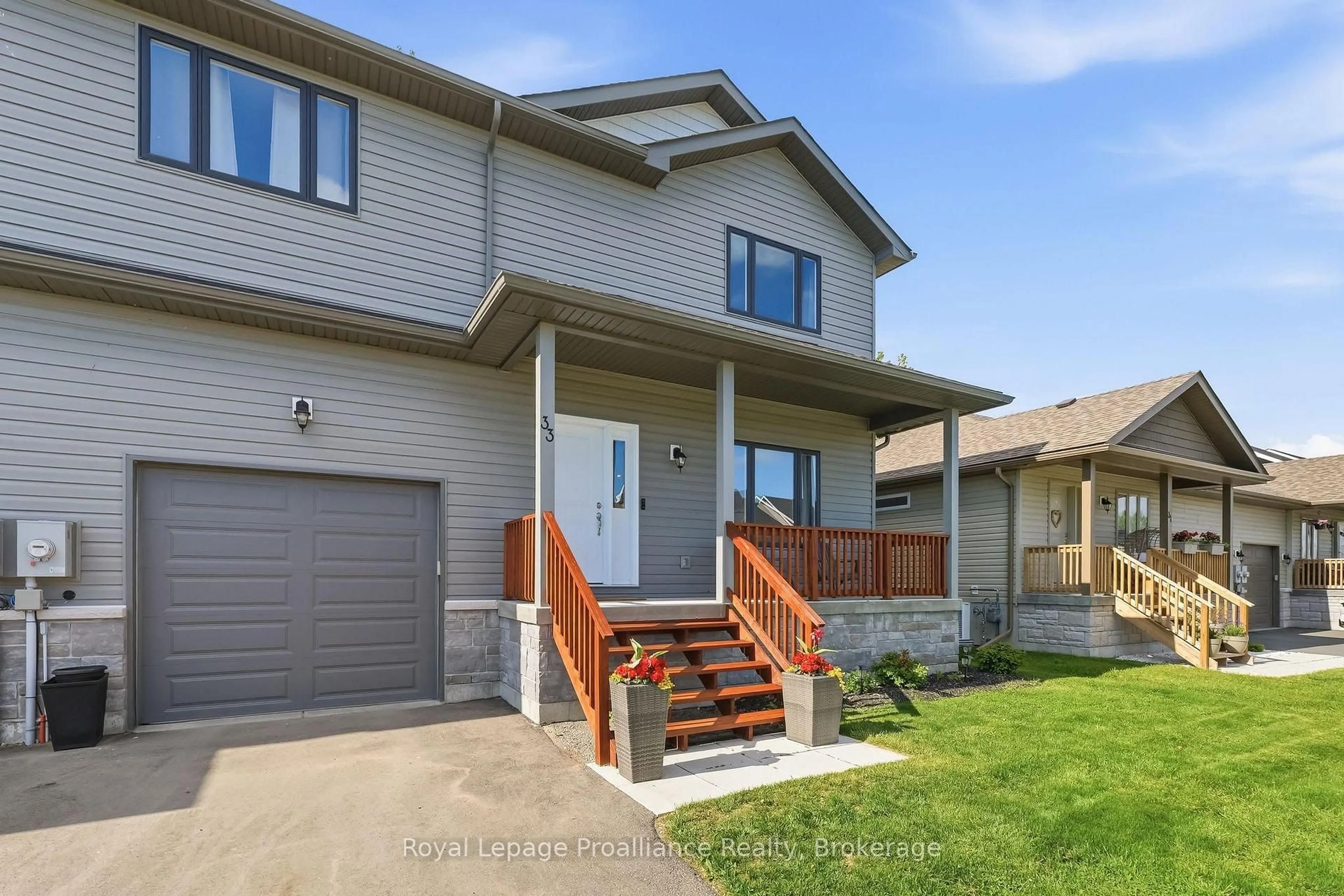 Home with vinyl exterior material, street for 33 Rabbit Rd, Brighton Ontario K0K 1H0
