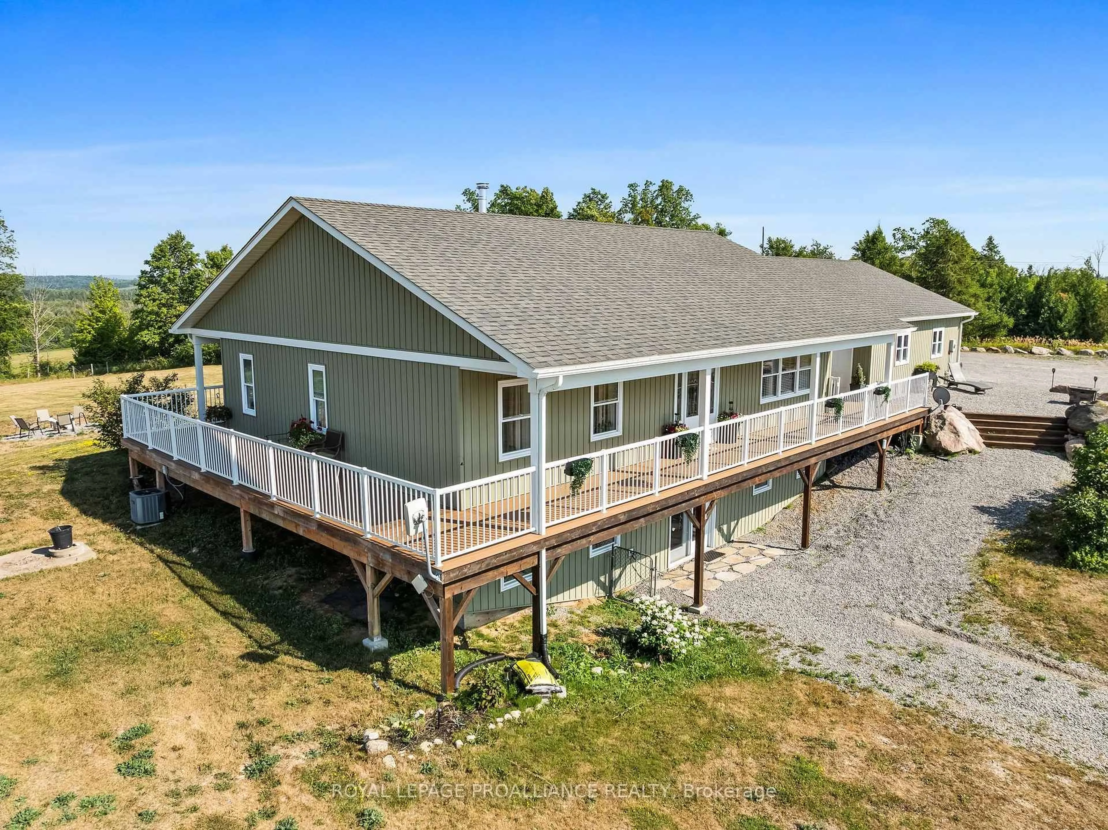 A pic from outside/outdoor area/front of a property/back of a property/a pic from drone, water/lake/river/ocean view for 1526 County Road 2, Otonabee-South Monaghan Ontario K0L 1B0