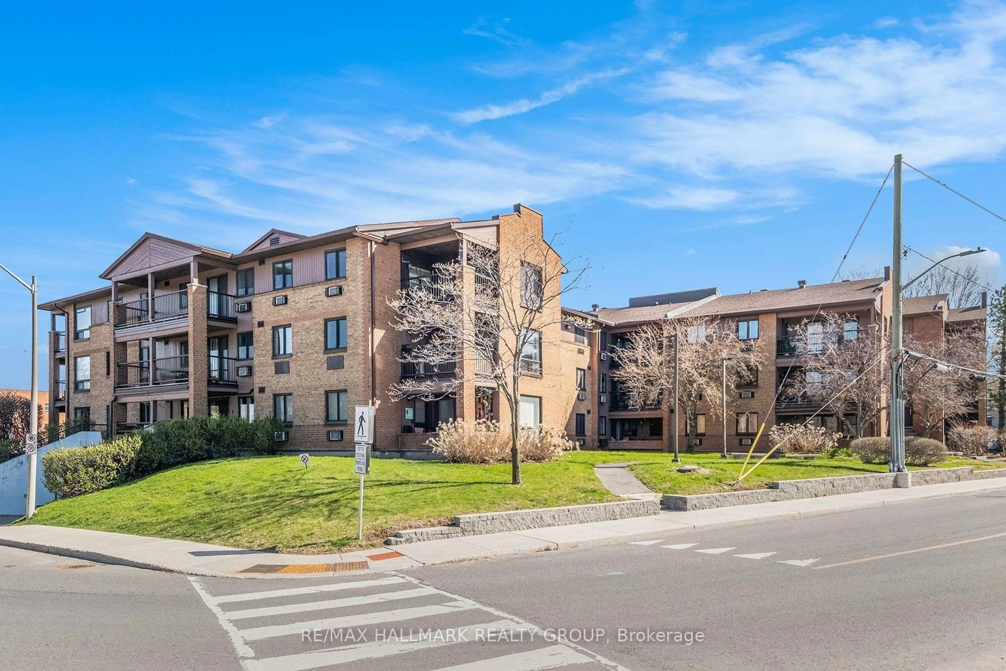 A pic from outside/outdoor area/front of a property/back of a property/a pic from drone, unknown for 316 Savard Ave #306, Ottawa Ontario K1L 7S2