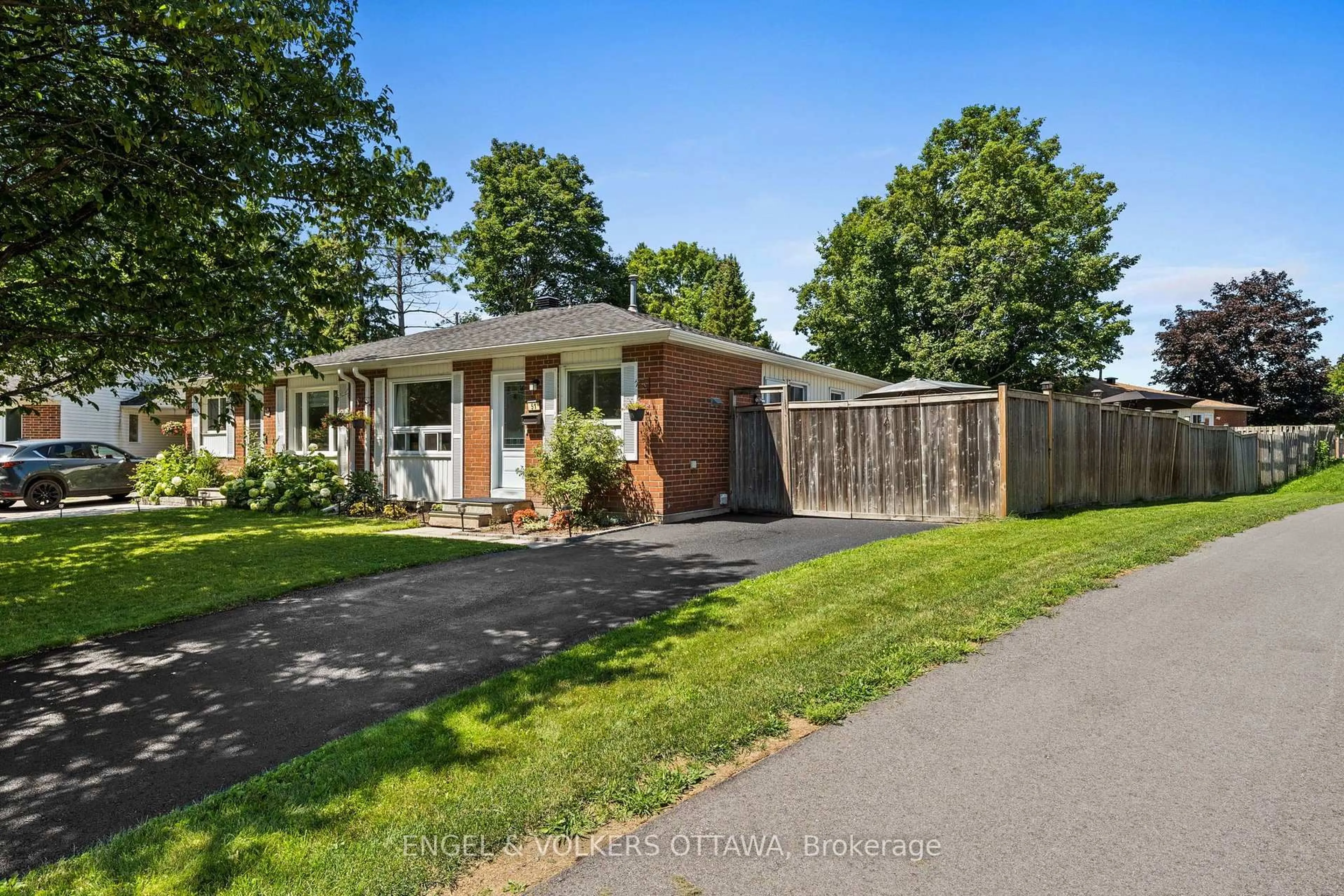 Home with brick exterior material, street for 51 Morton Dr, Ottawa Ontario K2L 1W9