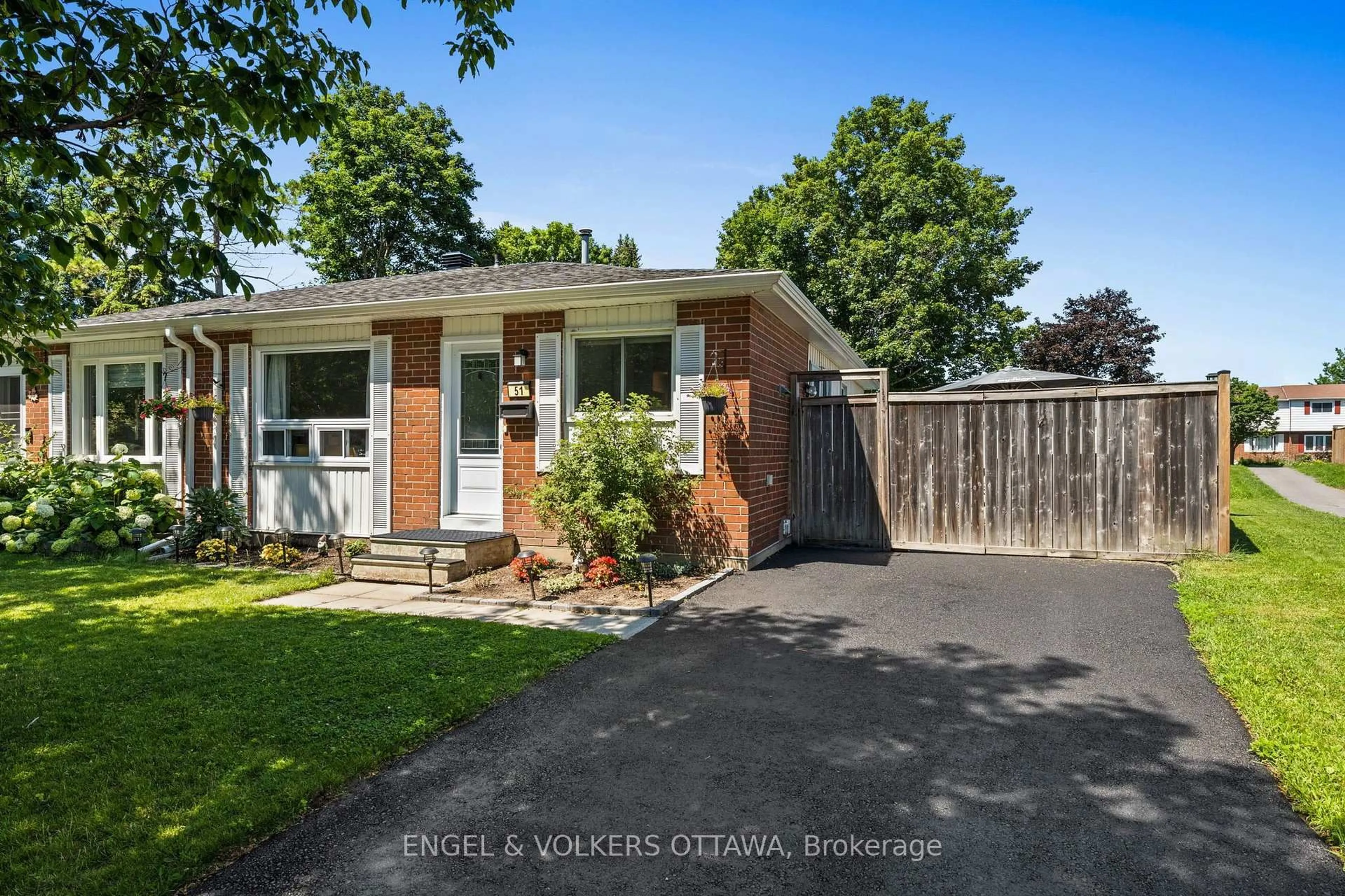 Home with brick exterior material, street for 51 Morton Dr, Ottawa Ontario K2L 1W9