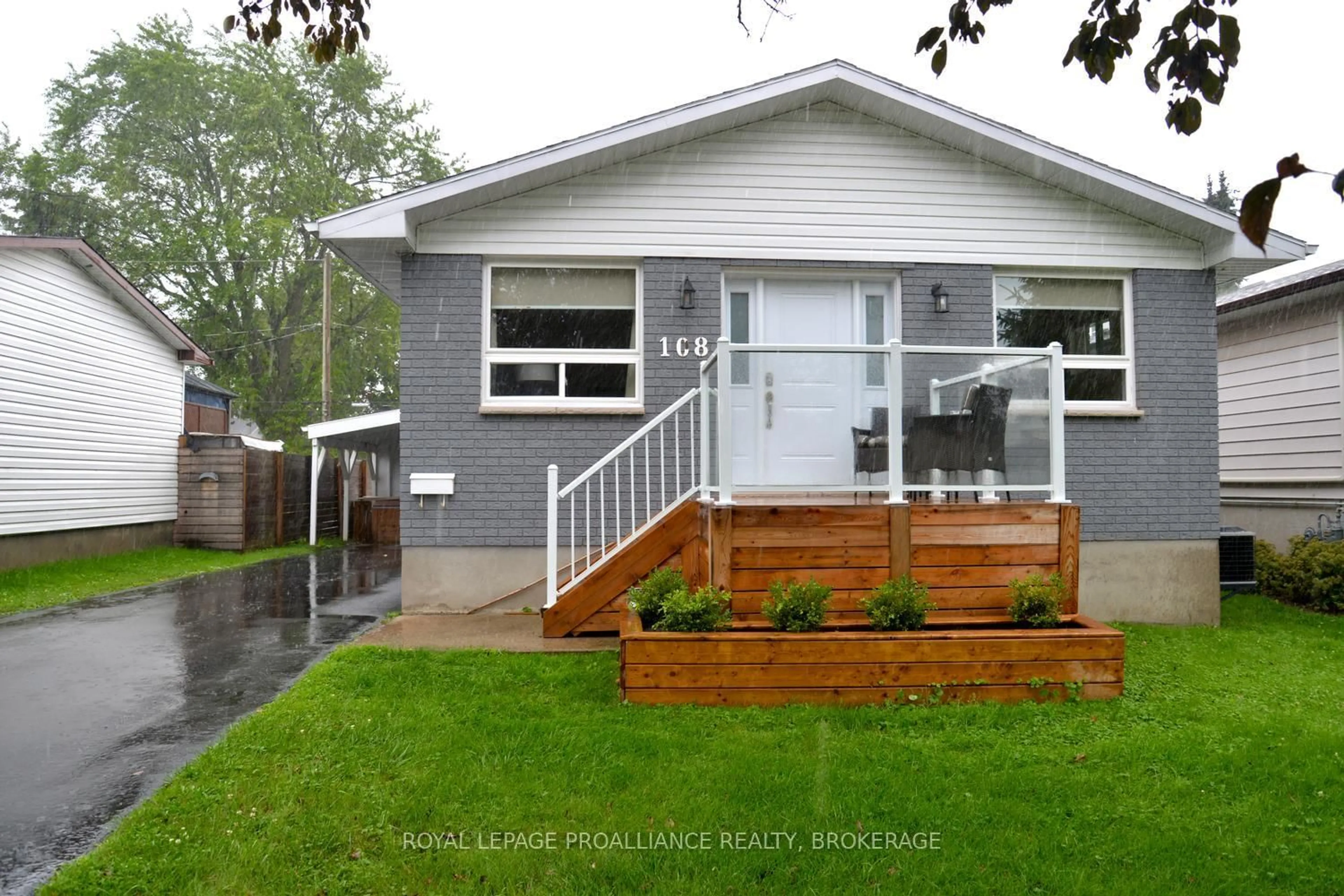 Home with vinyl exterior material, street for 108 Elmwood Dr, Gananoque Ontario K7G 1N9