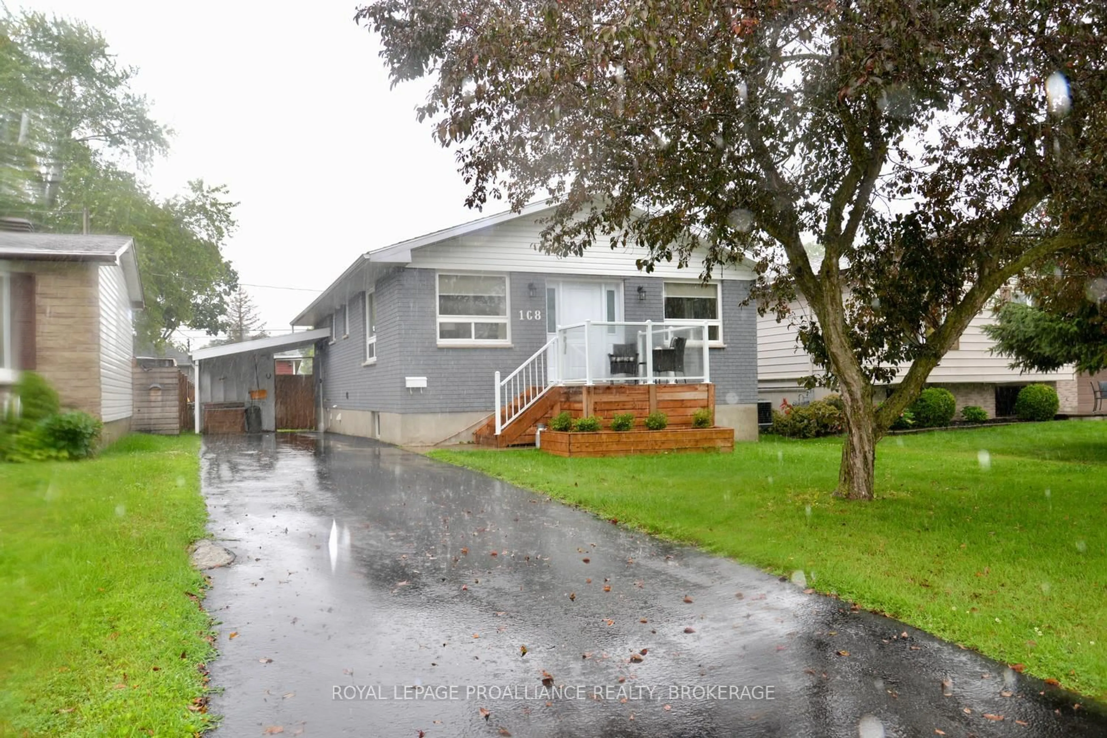 Home with vinyl exterior material, street for 108 Elmwood Dr, Gananoque Ontario K7G 1N9
