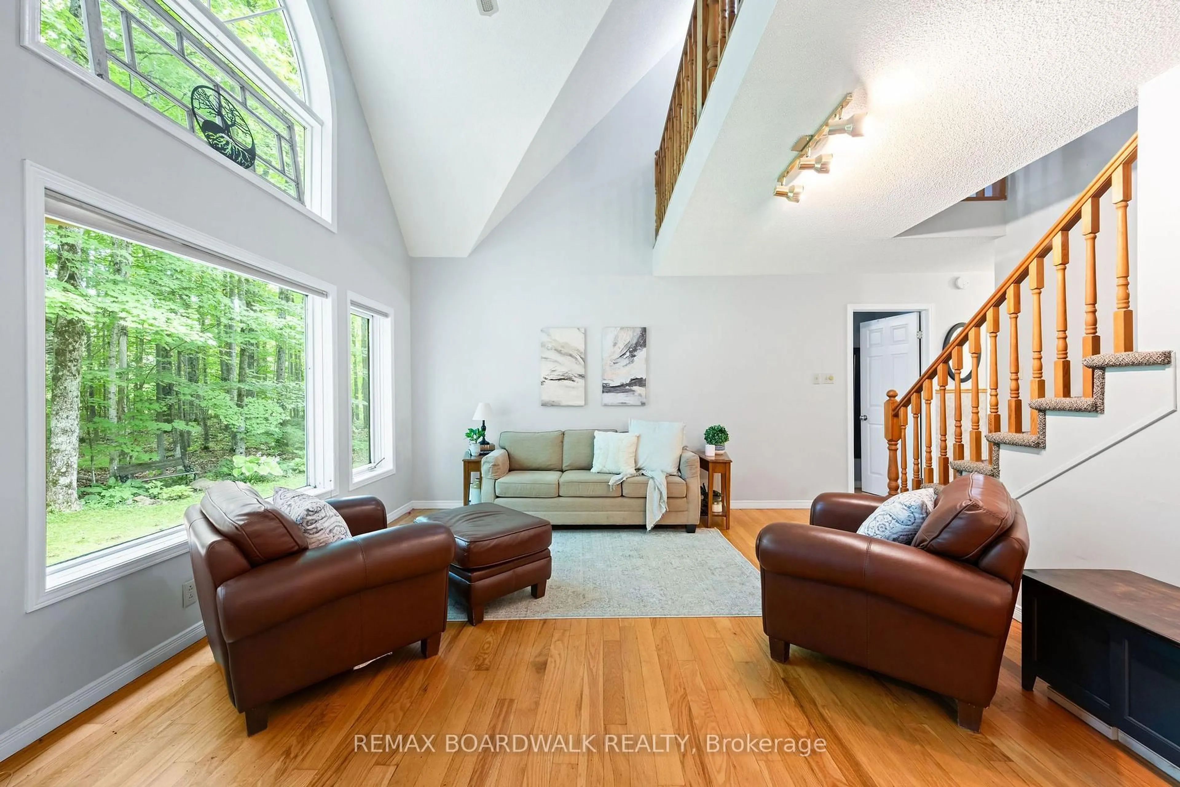 Living room with furniture, wood/laminate floor for 502 Tennyson Rd, Perth Ontario K7H 3C8