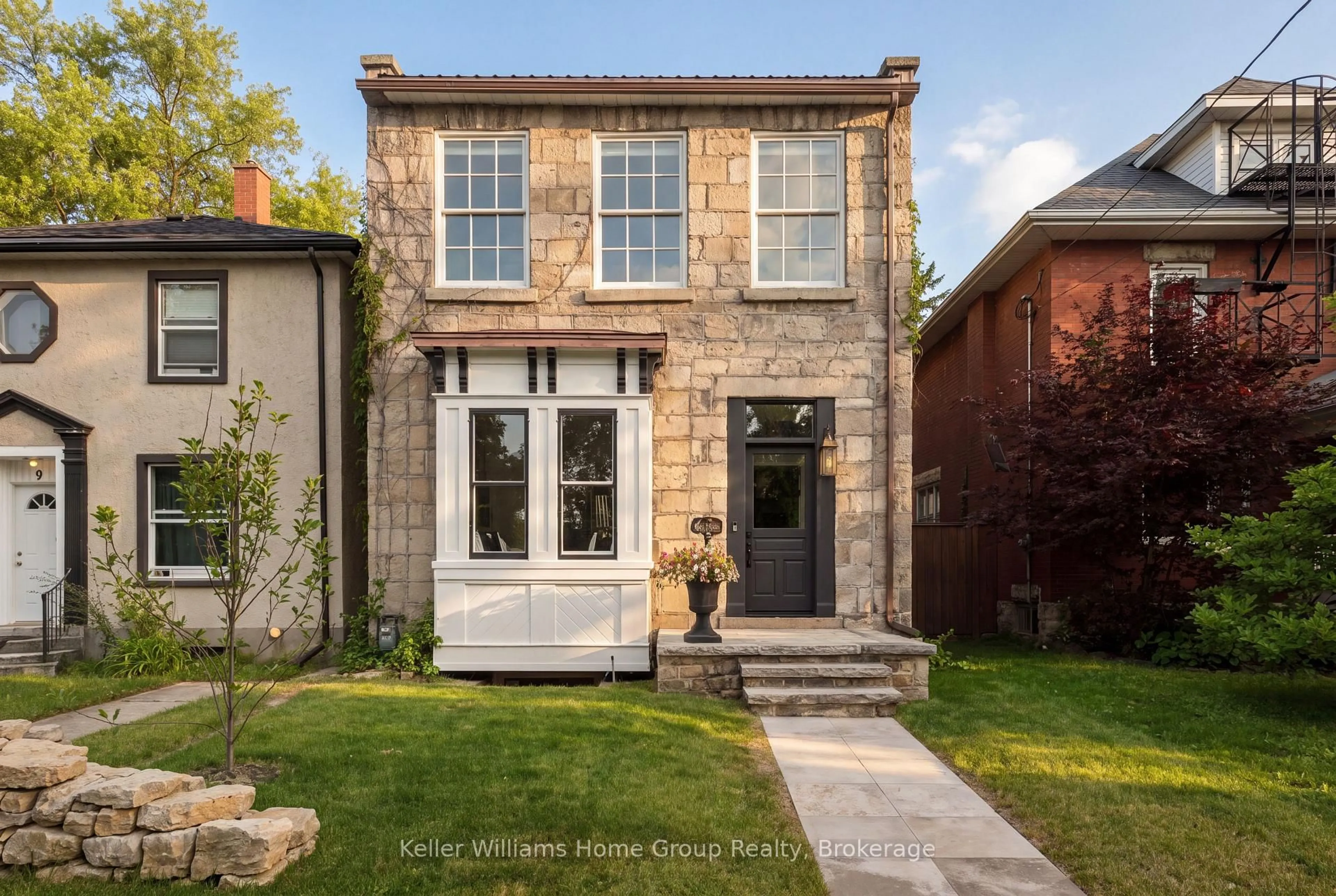 Home with brick exterior material, street for 7 Waterloo Ave, Guelph Ontario N1H 3H2