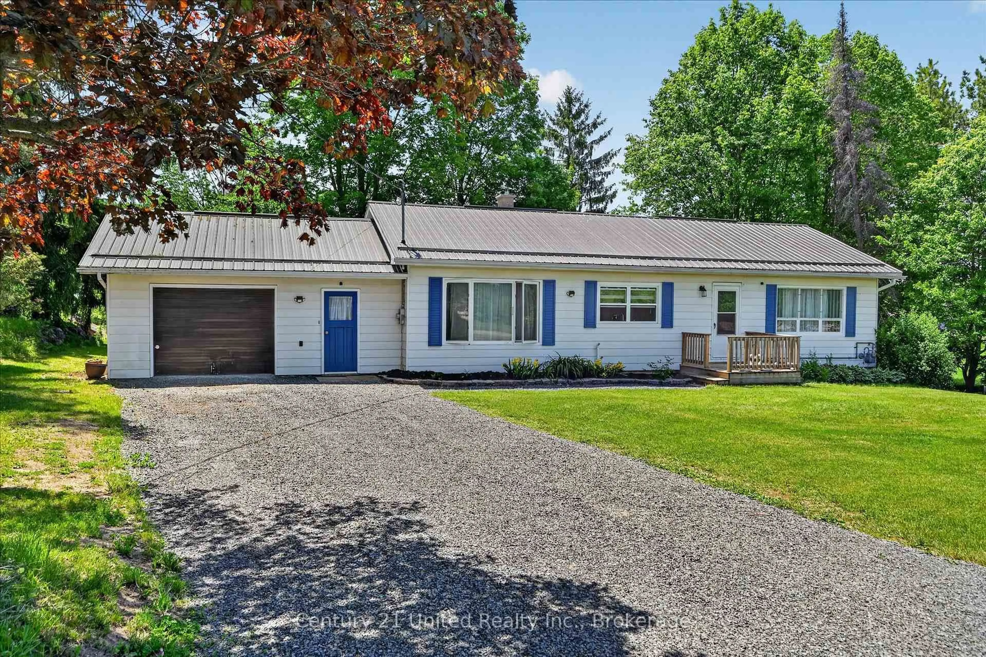 Home with vinyl exterior material, street for 323 St Lawrence St, Madoc Ontario K0K 2K0