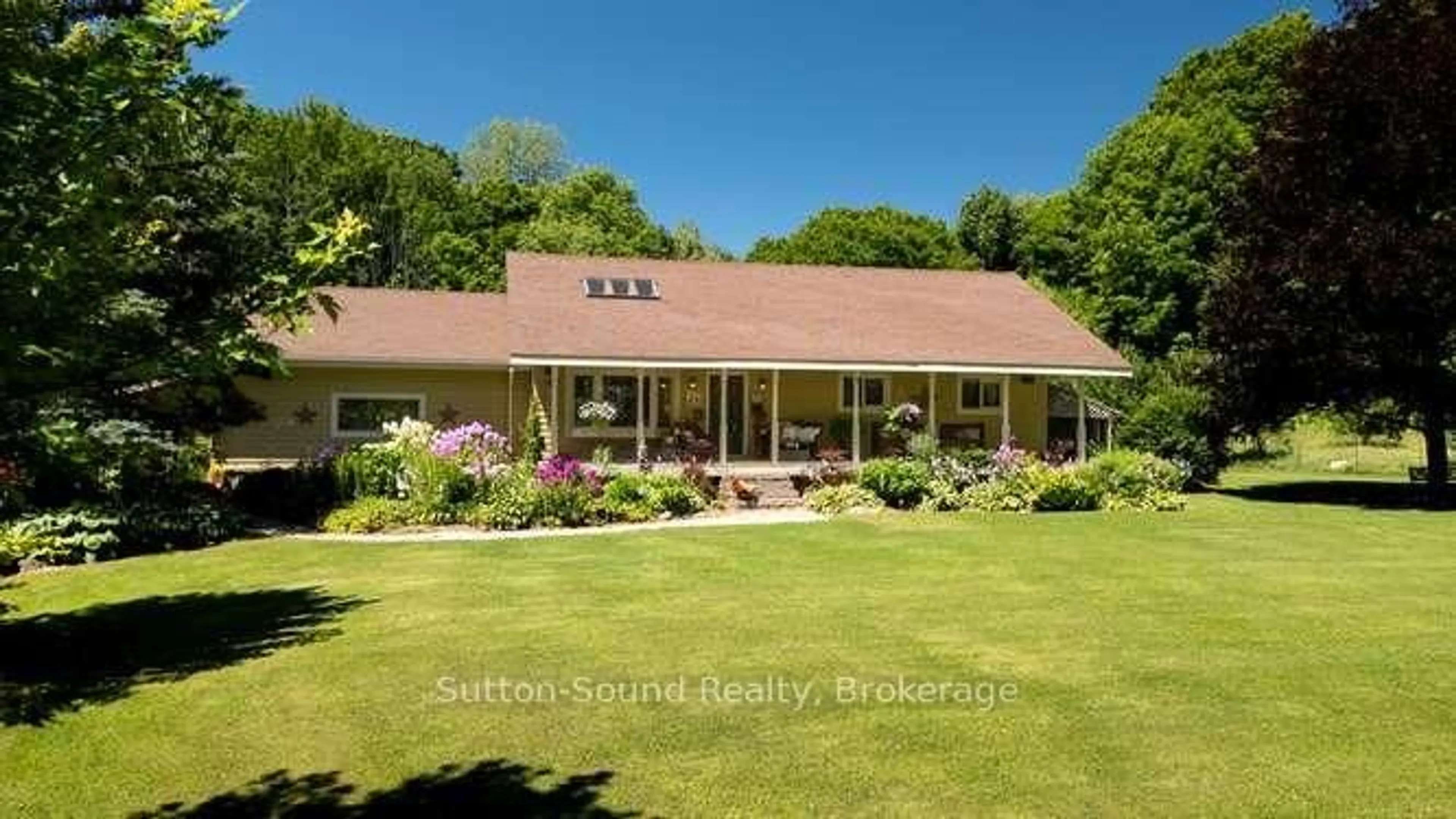 A pic from outside/outdoor area/front of a property/back of a property/a pic from drone, street for 130044 Sideroad 20 Sdrd, Georgian Bluffs Ontario N0H 2T0