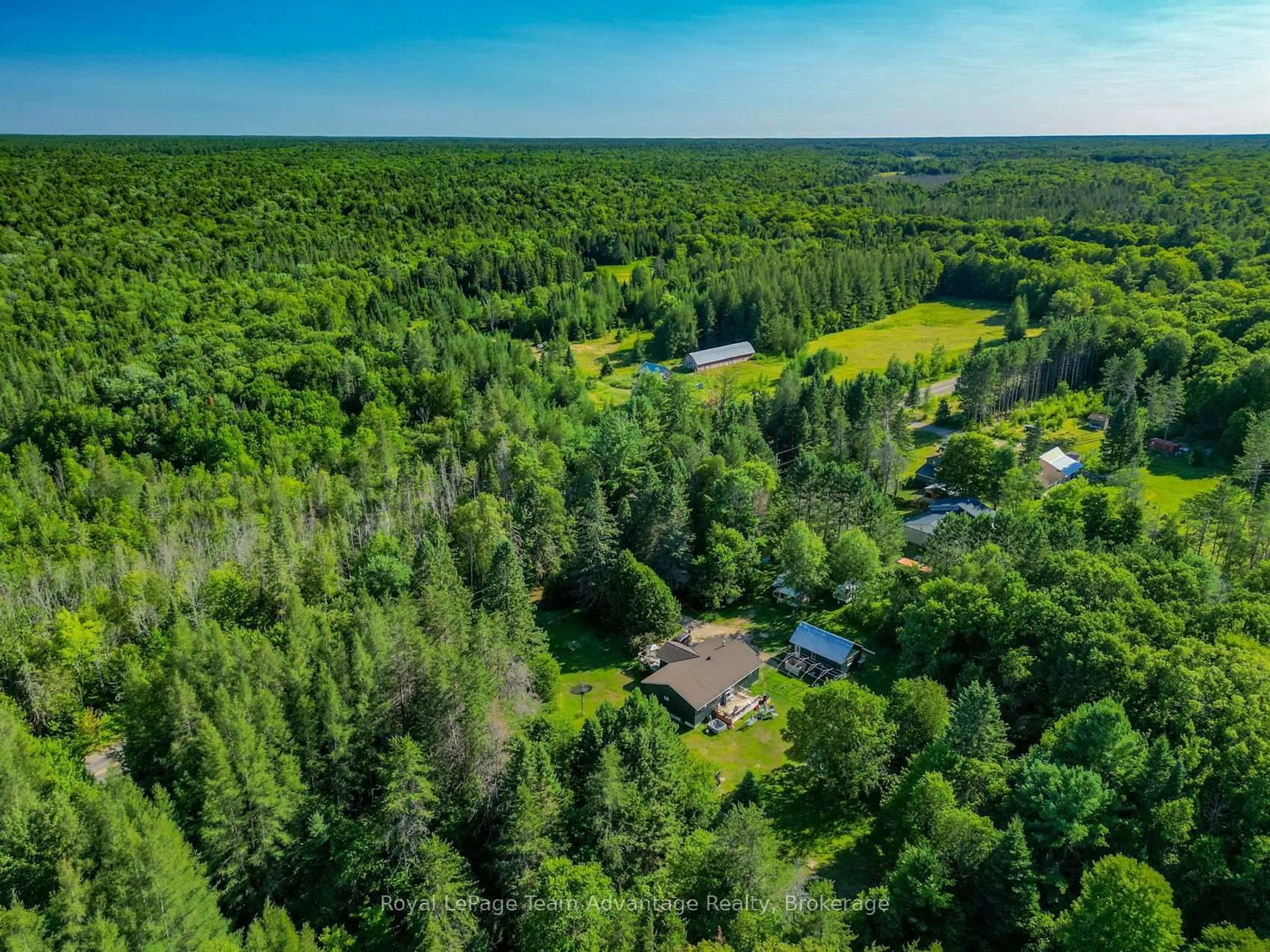 A pic from outside/outdoor area/front of a property/back of a property/a pic from drone, forest/trees view for 1081 Hwy 520 Highway, Whitestone Ontario P0A 1G0