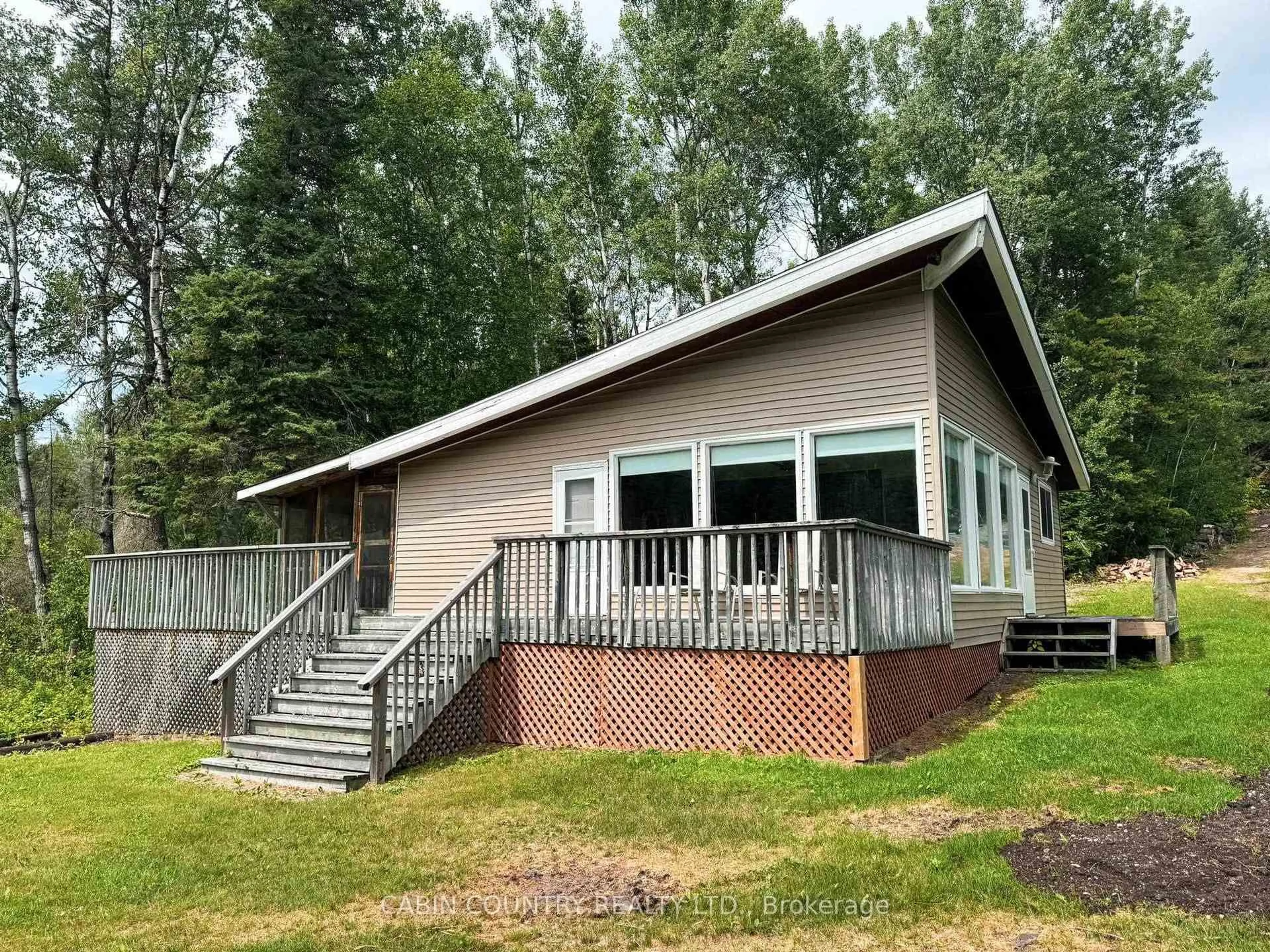 Home with vinyl exterior material, mountain view for 701A Red Pine Ridge Rd, Kenora Remote Area Ontario P0X 1C0