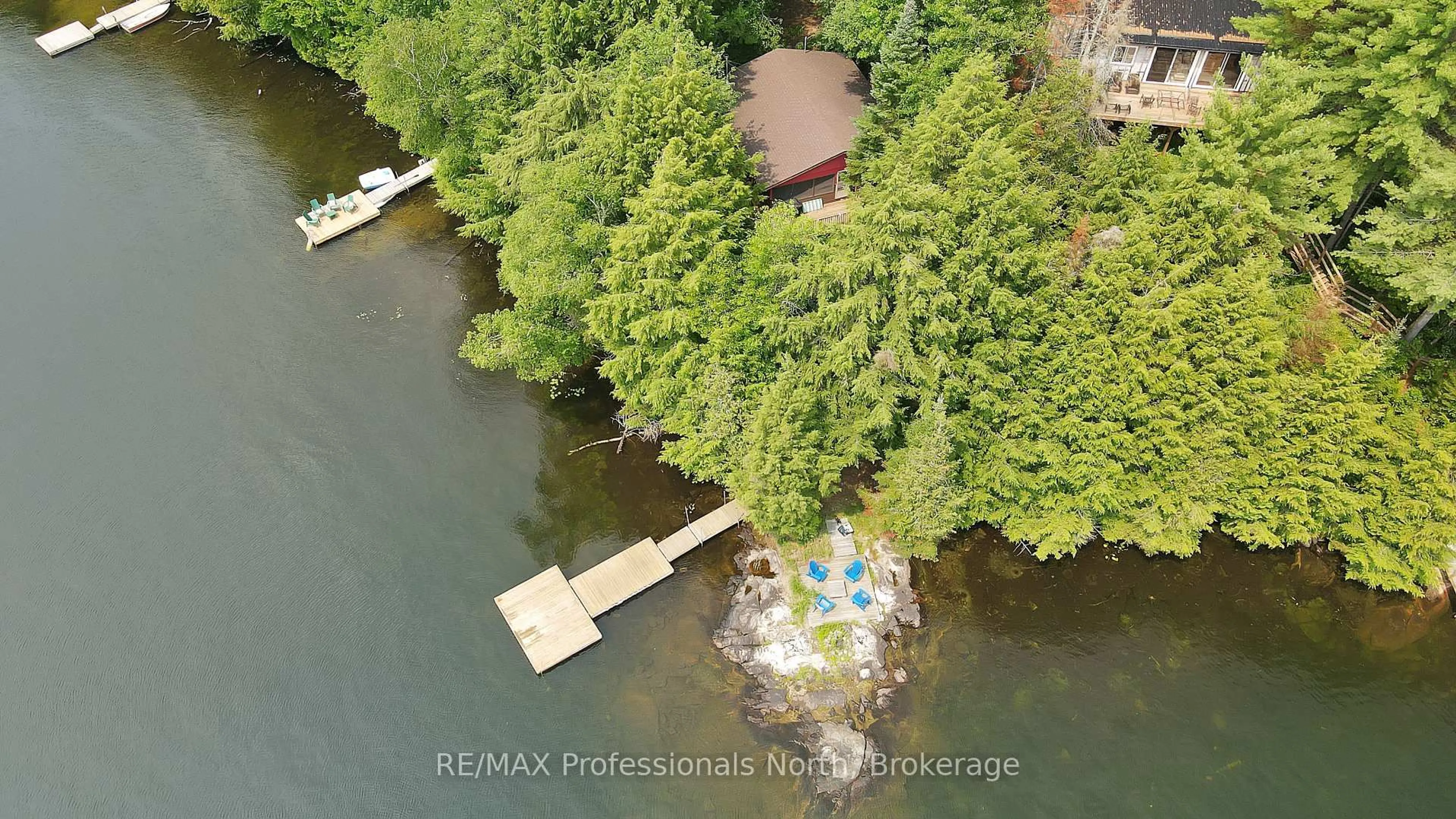 A pic from outside/outdoor area/front of a property/back of a property/a pic from drone, water/lake/river/ocean view for 1072 Junco Lane, Dysart et al Ontario K0L 1X0