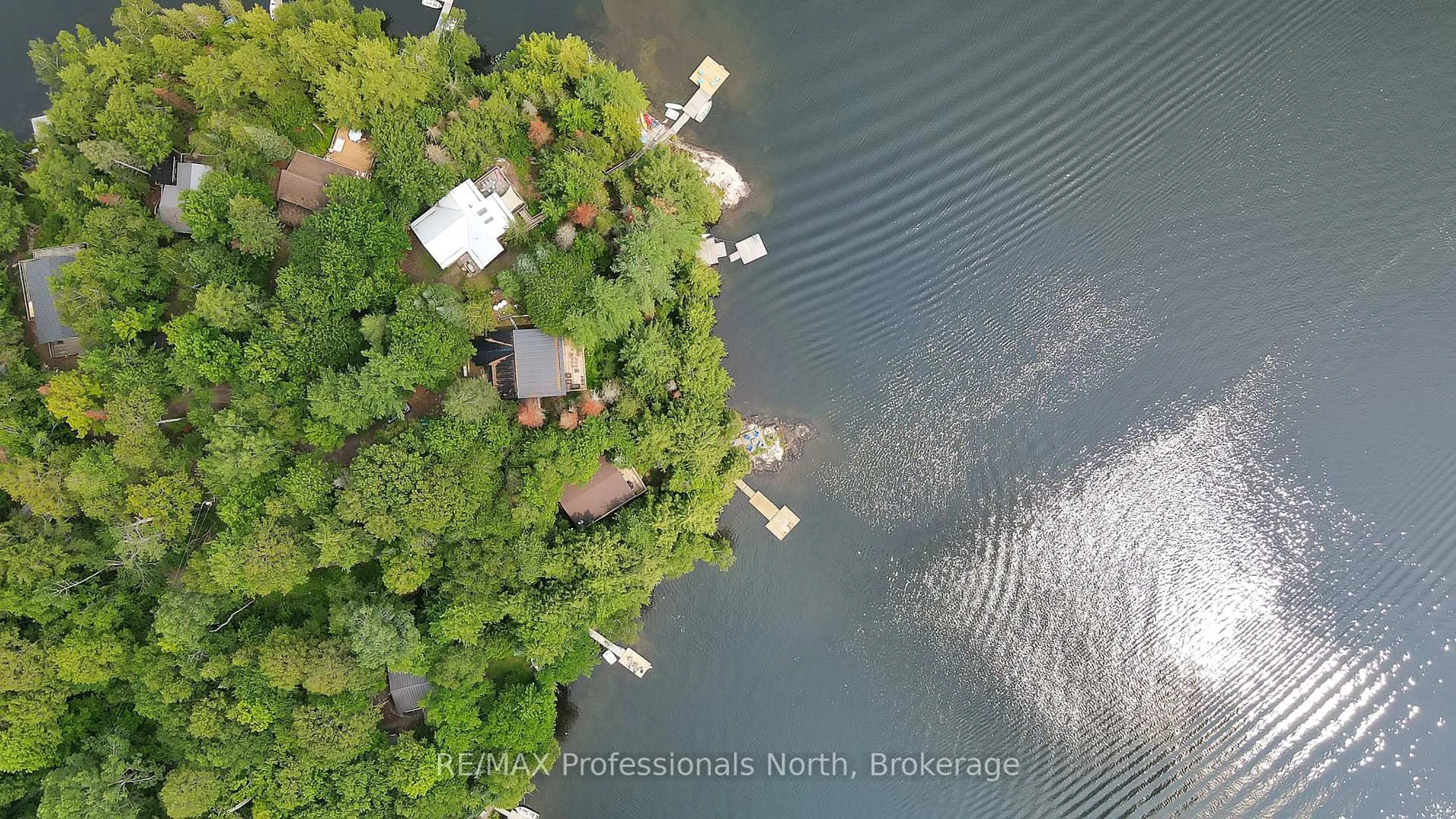 A pic from outside/outdoor area/front of a property/back of a property/a pic from drone, water/lake/river/ocean view for 1072 Junco Lane, Dysart et al Ontario K0L 1X0