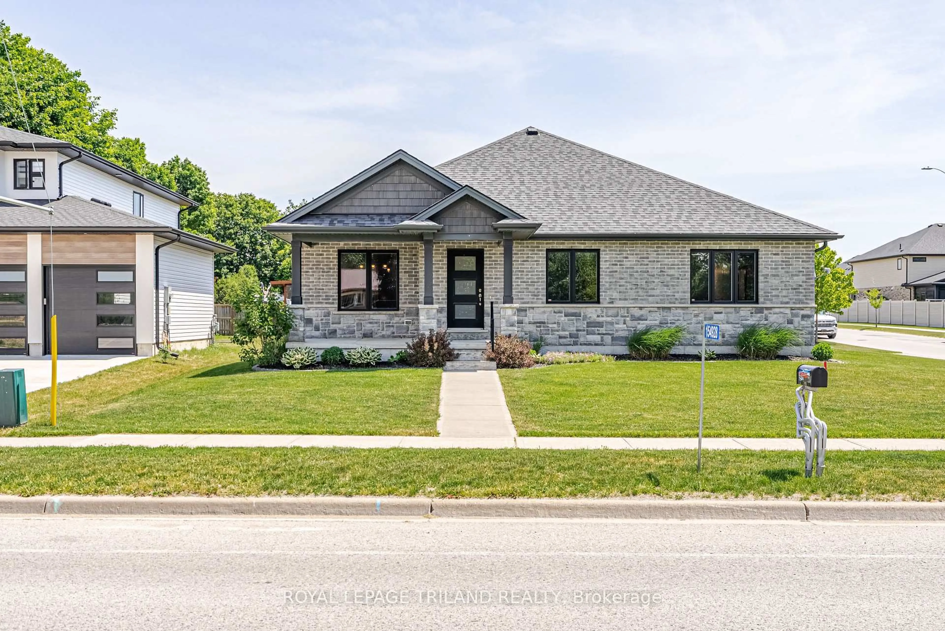 Home with brick exterior material, street for 154928 15th Line, Zorra Ontario N0M 2M0