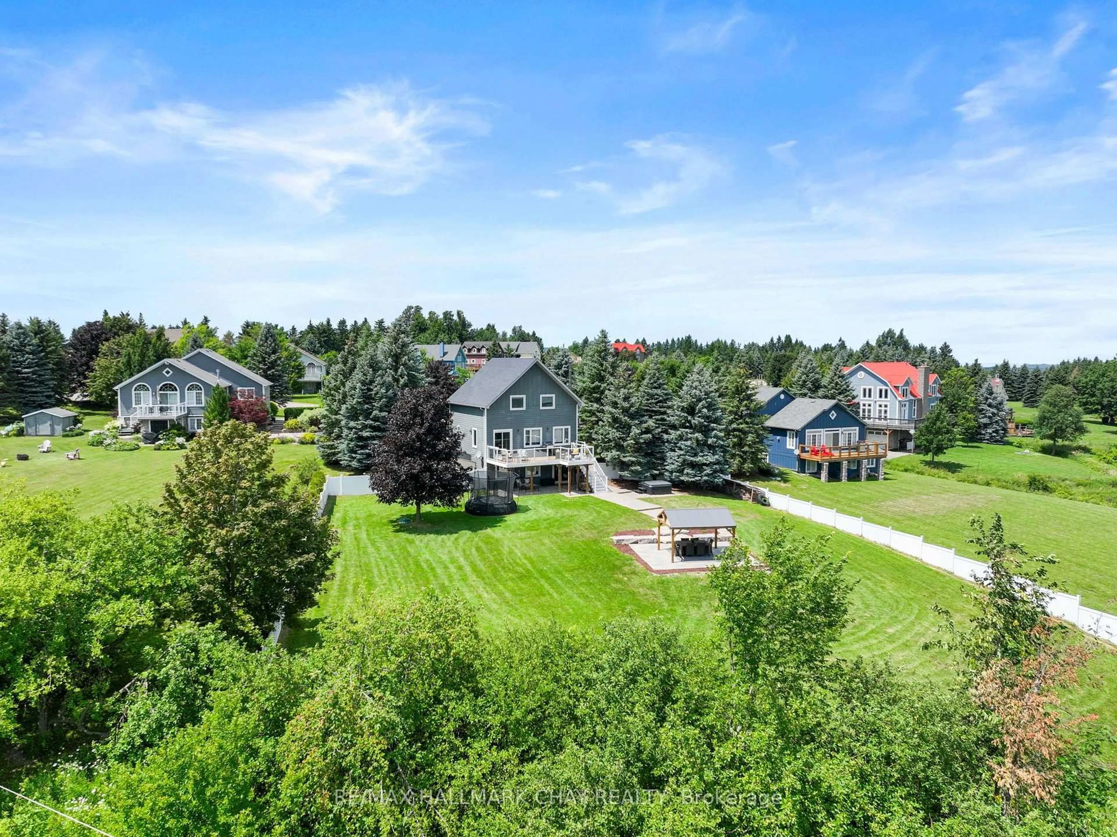 A pic from outside/outdoor area/front of a property/back of a property/a pic from drone, unknown for 8 Lloyd's Traverse Cres, Mulmur Ontario L9V 3H6