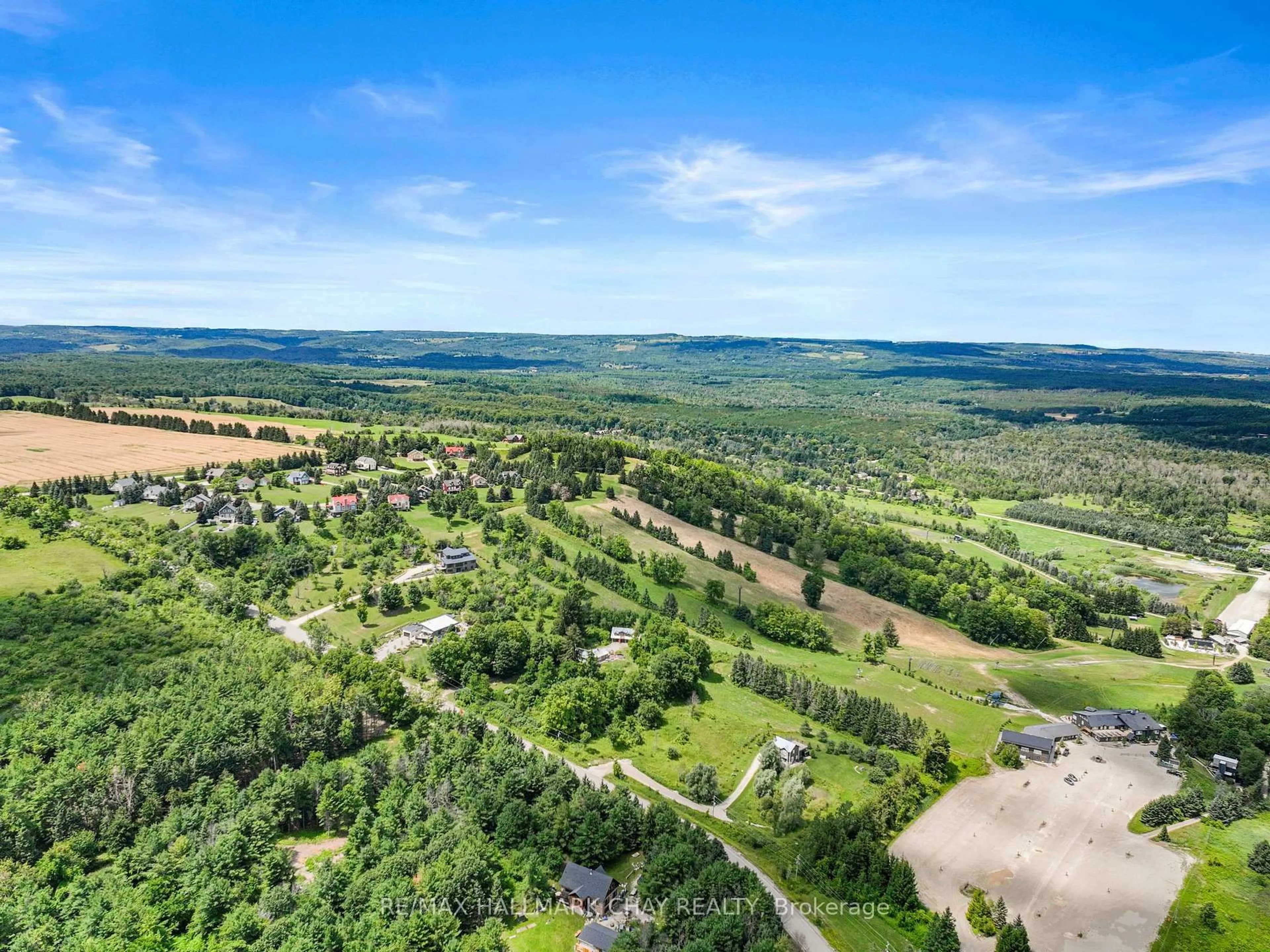 A pic from outside/outdoor area/front of a property/back of a property/a pic from drone, forest/trees view for 8 Lloyd's Traverse Cres, Mulmur Ontario L9V 3H6