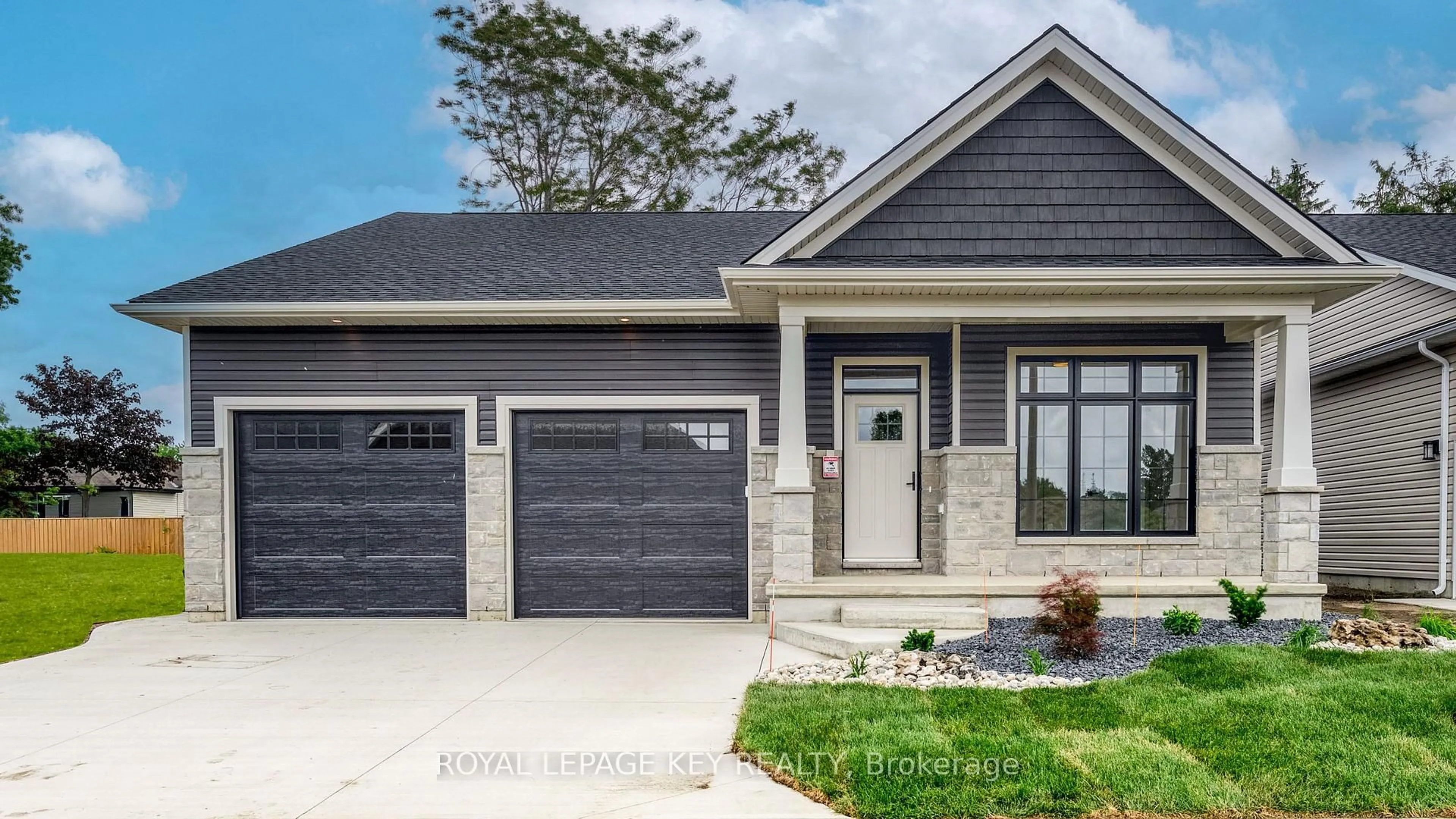 Home with brick exterior material, street for 1716 Cottage Lane #28, Sarnia Ontario N0N 1C0