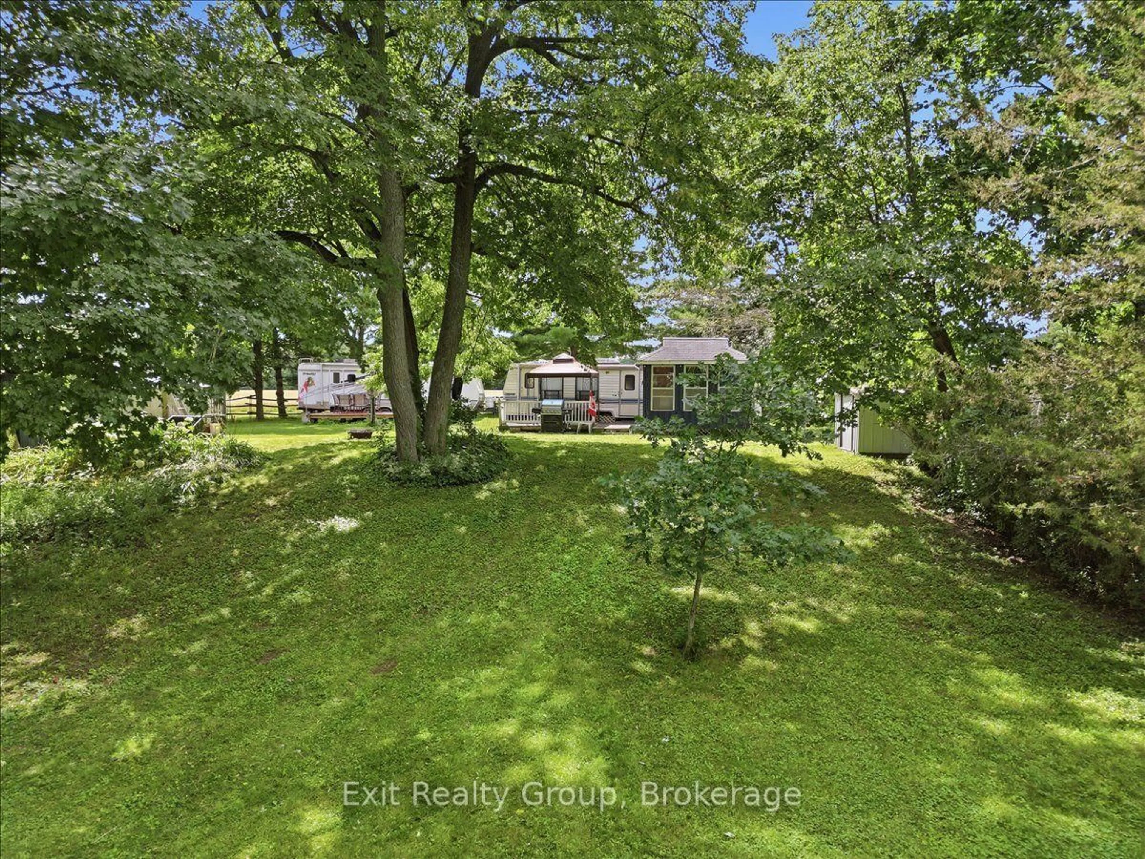 A pic from outside/outdoor area/front of a property/back of a property/a pic from drone, forest/trees view for 71 Cooke Lane, Hastings Ontario K0K 2C0
