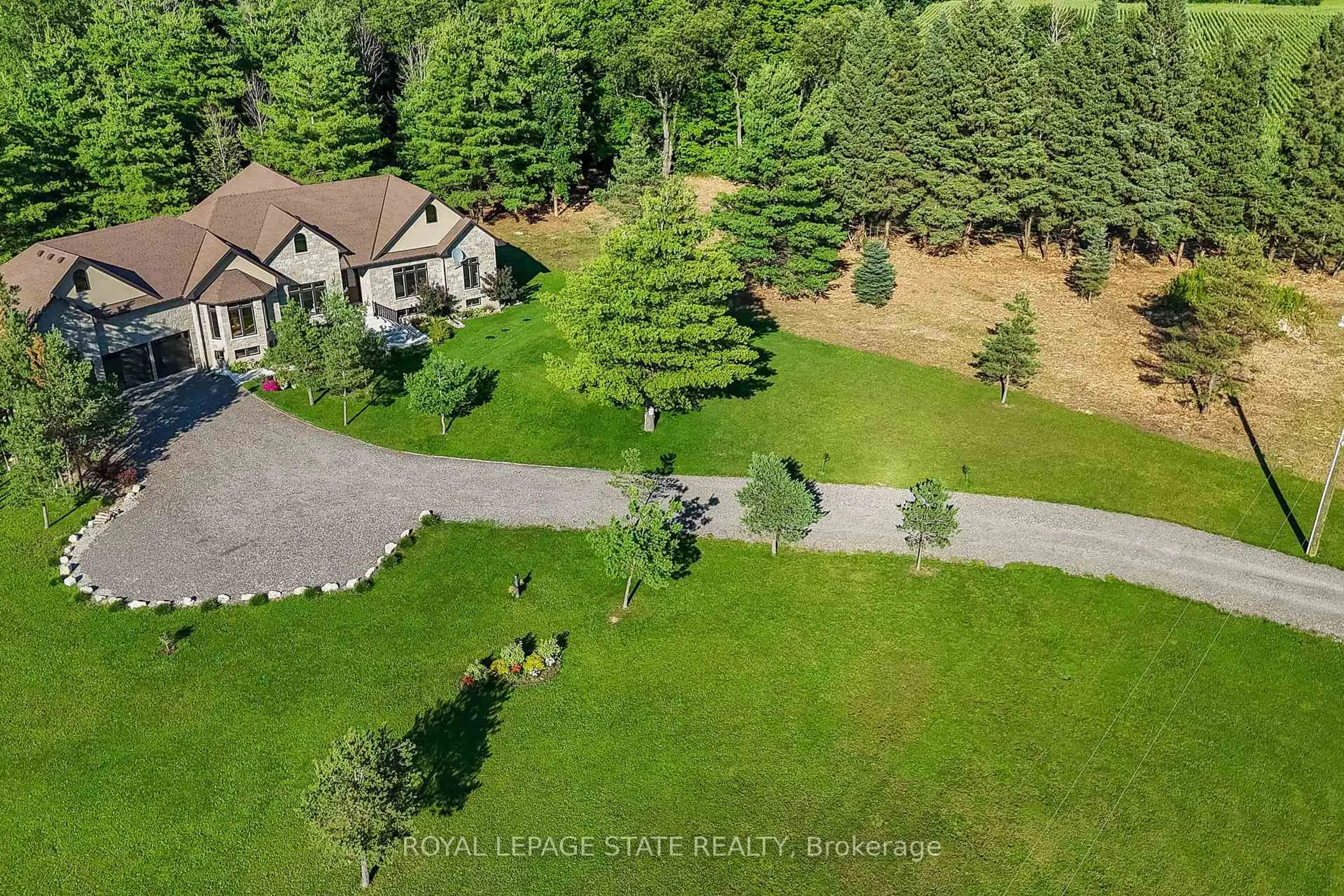 A pic from outside/outdoor area/front of a property/back of a property/a pic from drone, forest/trees view for 986 Highway 8, Hamilton Ontario L9H 5E1