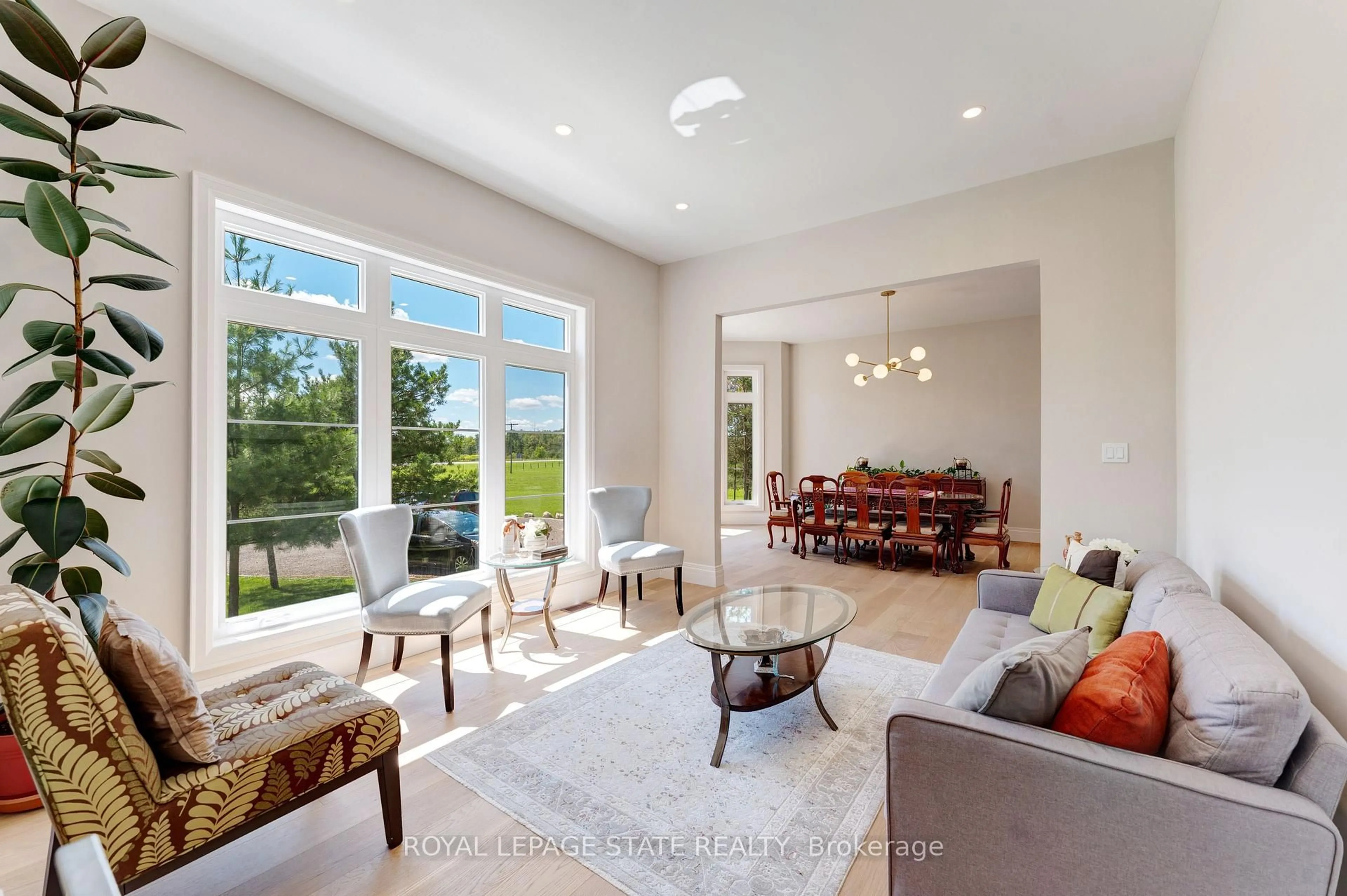 Living room with furniture, ceramic/tile floor for 986 Highway 8, Hamilton Ontario L9H 5E1
