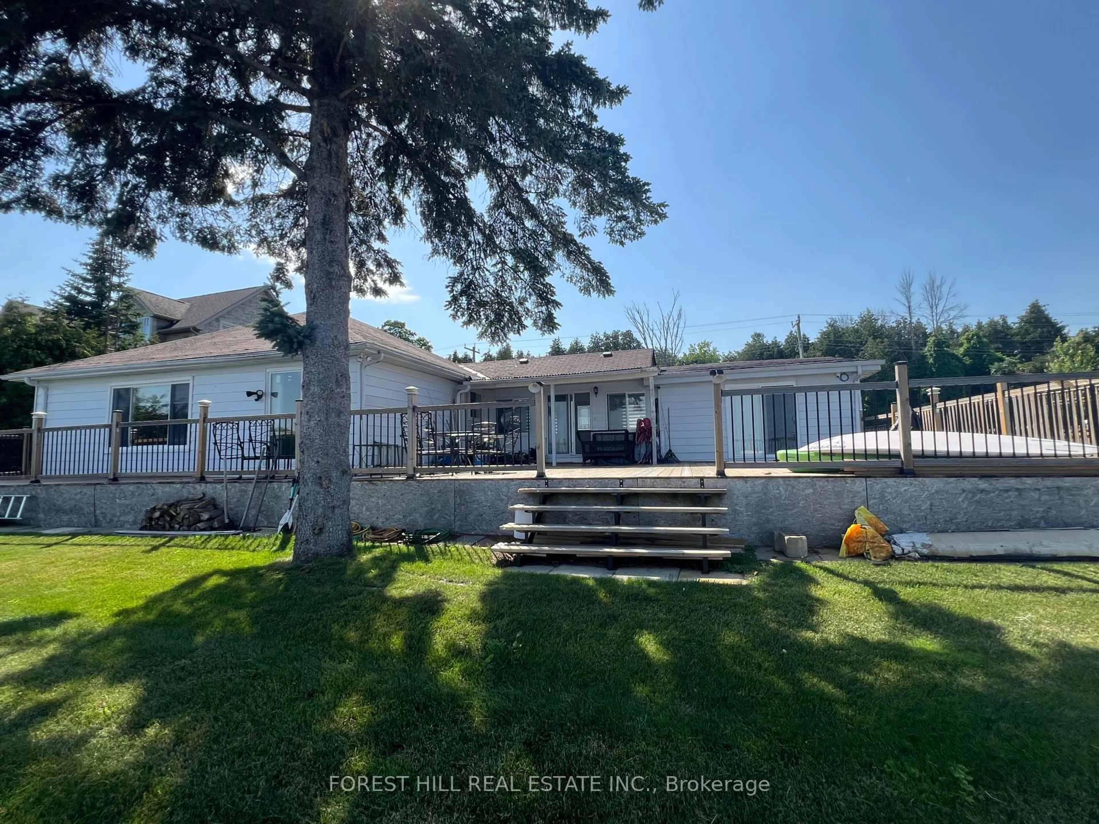A pic from outside/outdoor area/front of a property/back of a property/a pic from drone, water/lake/river/ocean view for 1161 Connaught Dr, Selwyn Ontario K0L 1T0