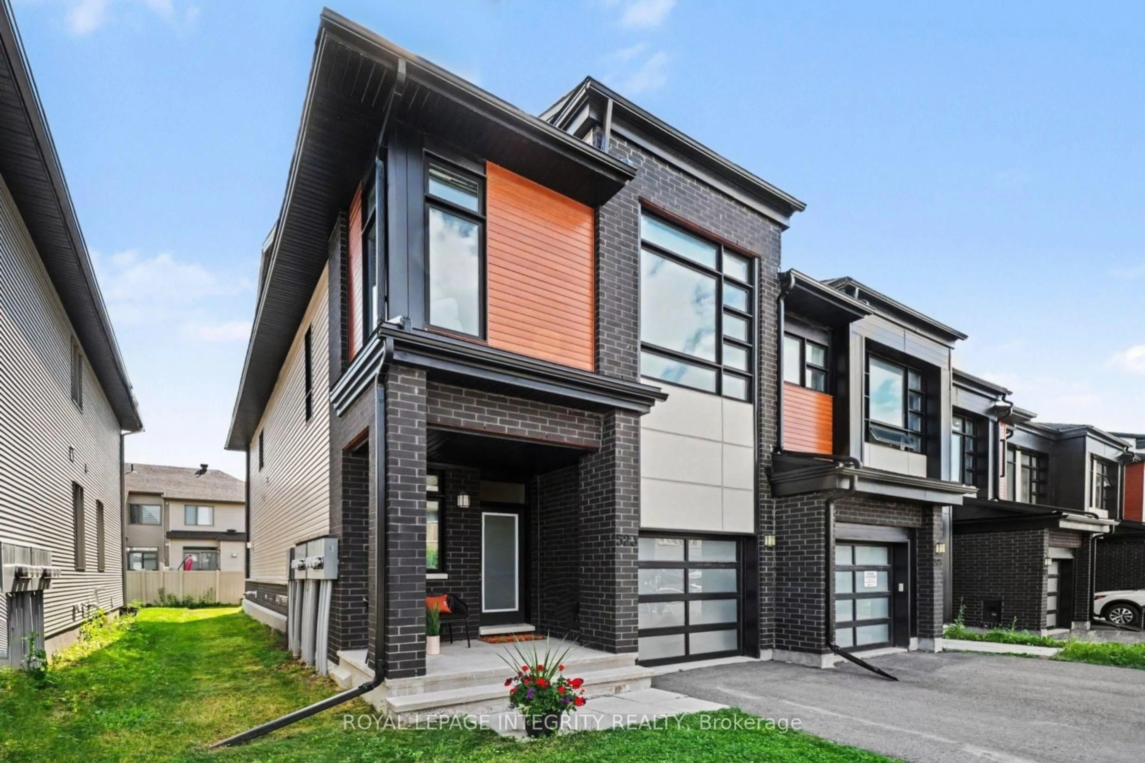 Home with brick exterior material, street for 523 Triangle St, Ottawa Ontario K2V 0M7