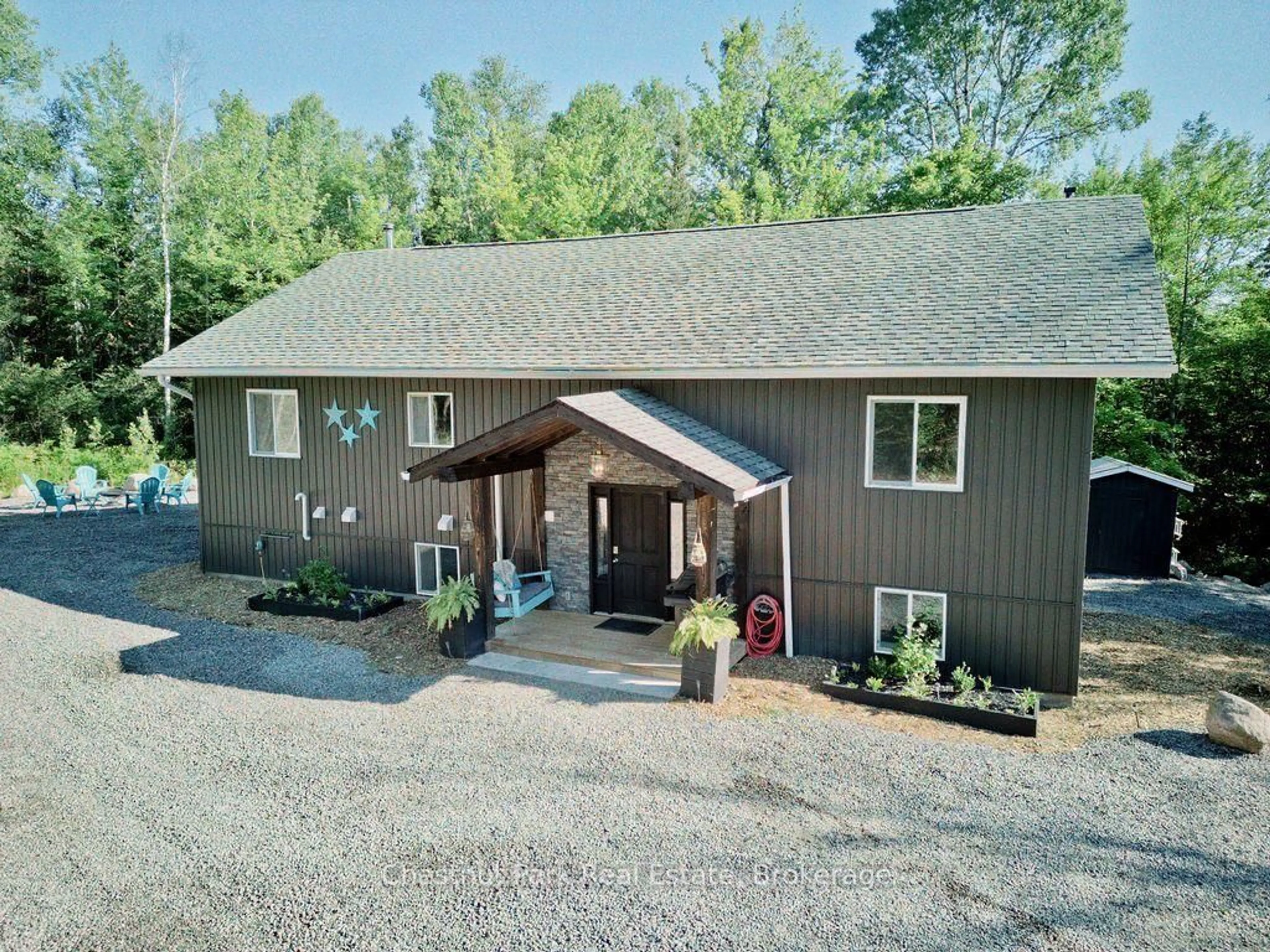 A pic from outside/outdoor area/front of a property/back of a property/a pic from drone, unknown for 1170 Alderdale Rd, Powassan Ontario P0H 1Z0