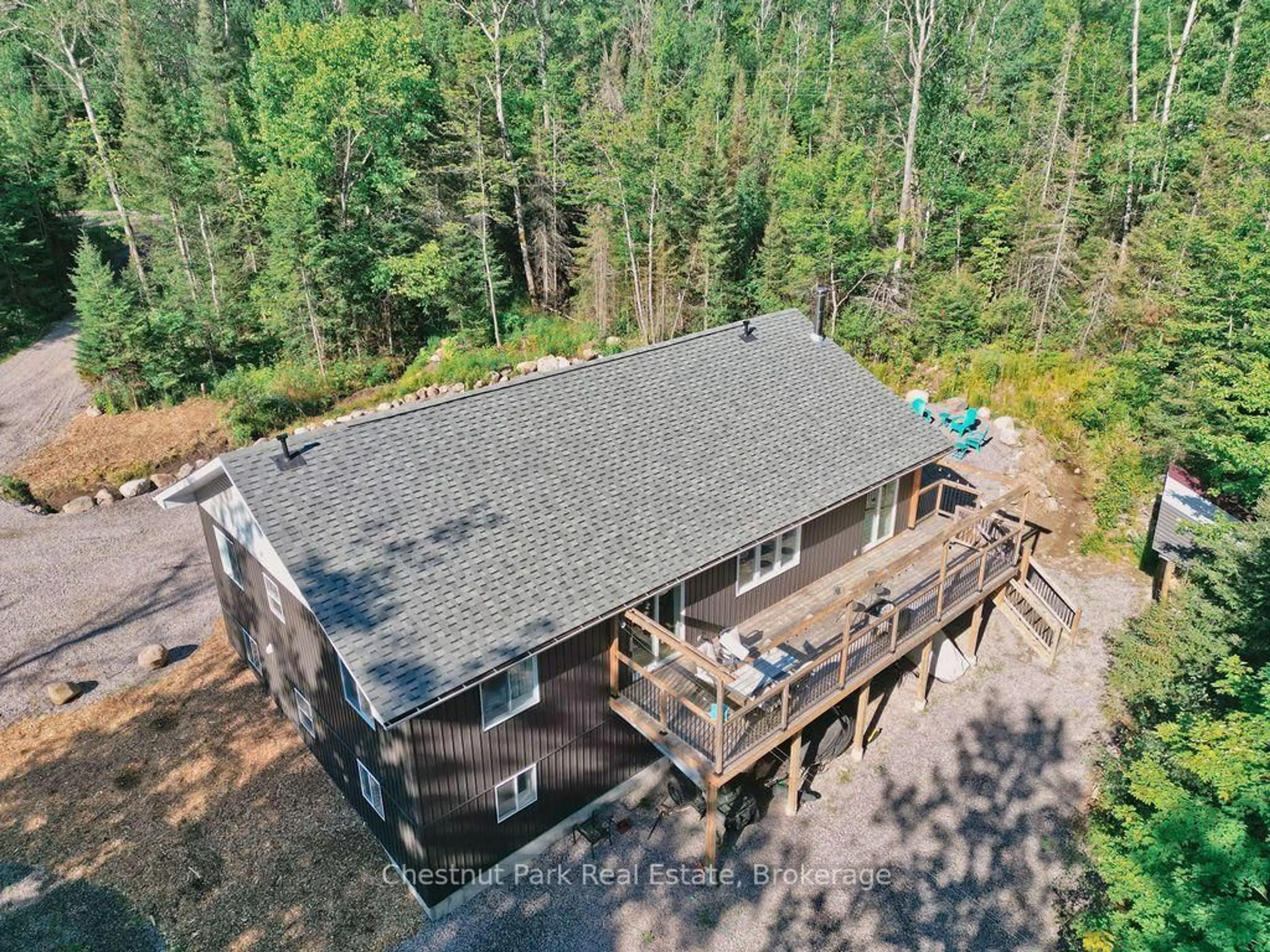 A pic from outside/outdoor area/front of a property/back of a property/a pic from drone, forest/trees view for 1170 Alderdale Rd, Powassan Ontario P0H 1Z0