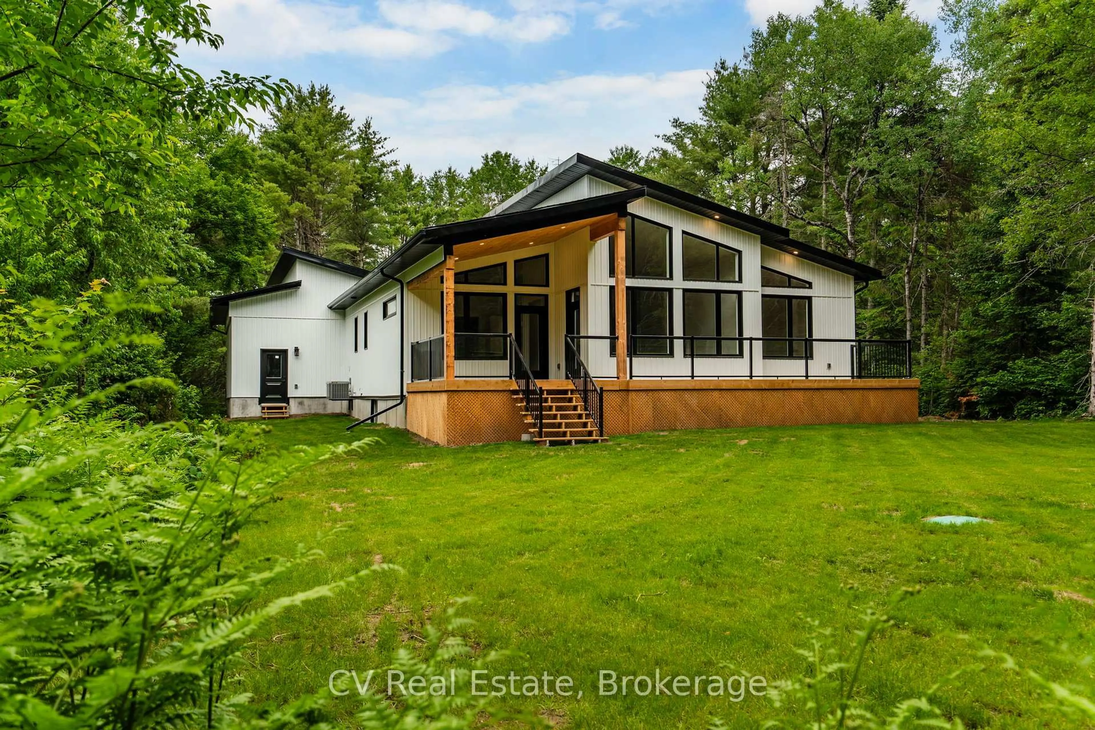 A pic from outside/outdoor area/front of a property/back of a property/a pic from drone, water/lake/river/ocean view for 546 Balsam Chutes Rd, Huntsville Ontario P0B 1L0