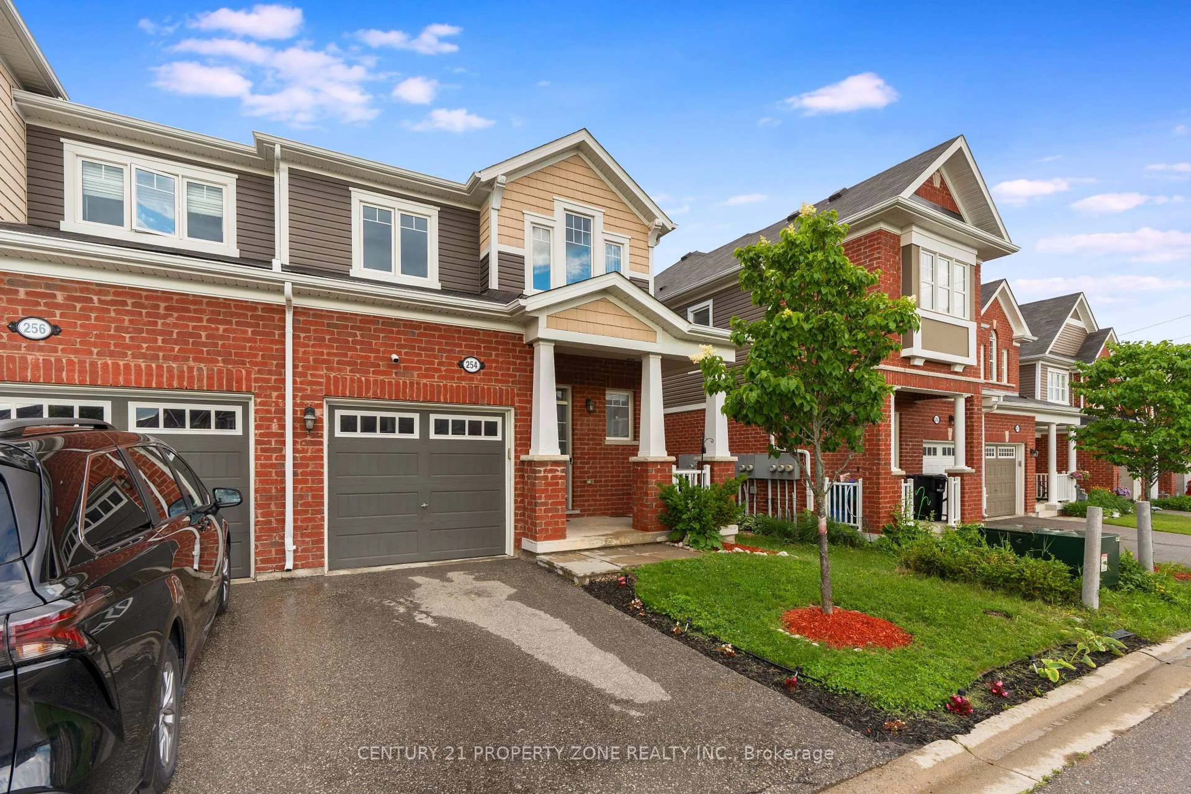 Home with brick exterior material, street for 254 Waterbrook Lane, Kitchener Ontario N2P 0H7