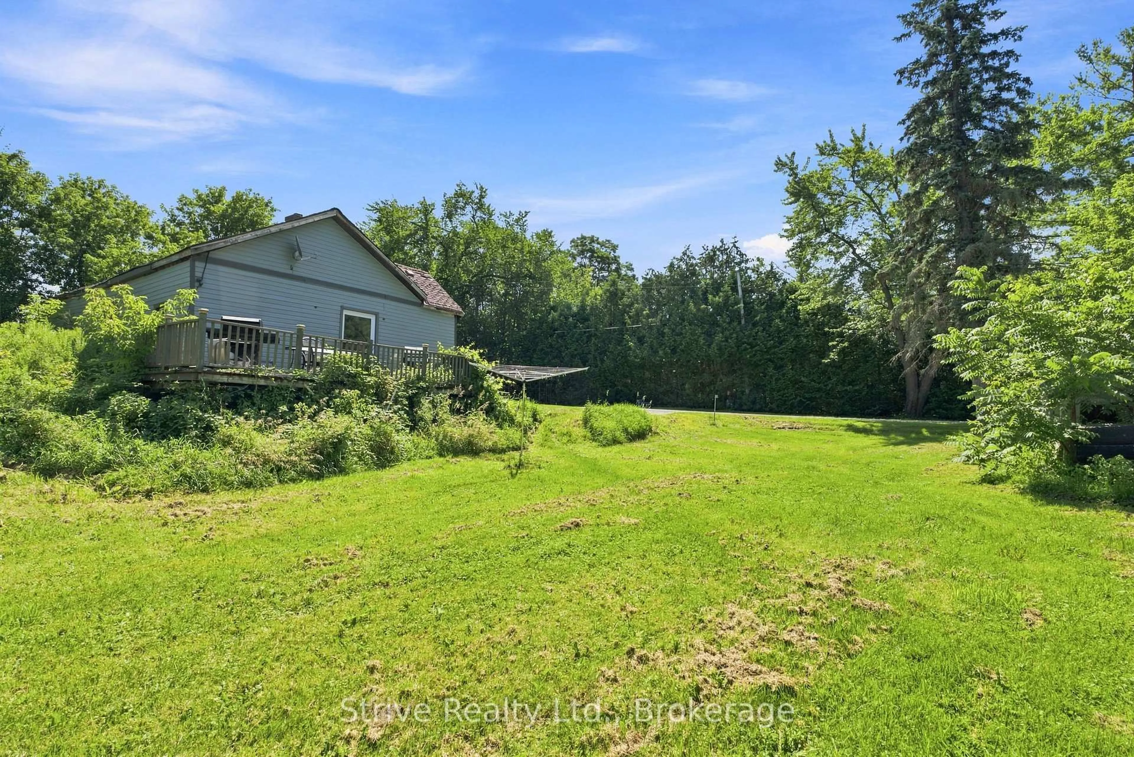 A pic from outside/outdoor area/front of a property/back of a property/a pic from drone, water/lake/river/ocean view for 916 King George St, Cavan Monaghan Ontario L0A 1C0