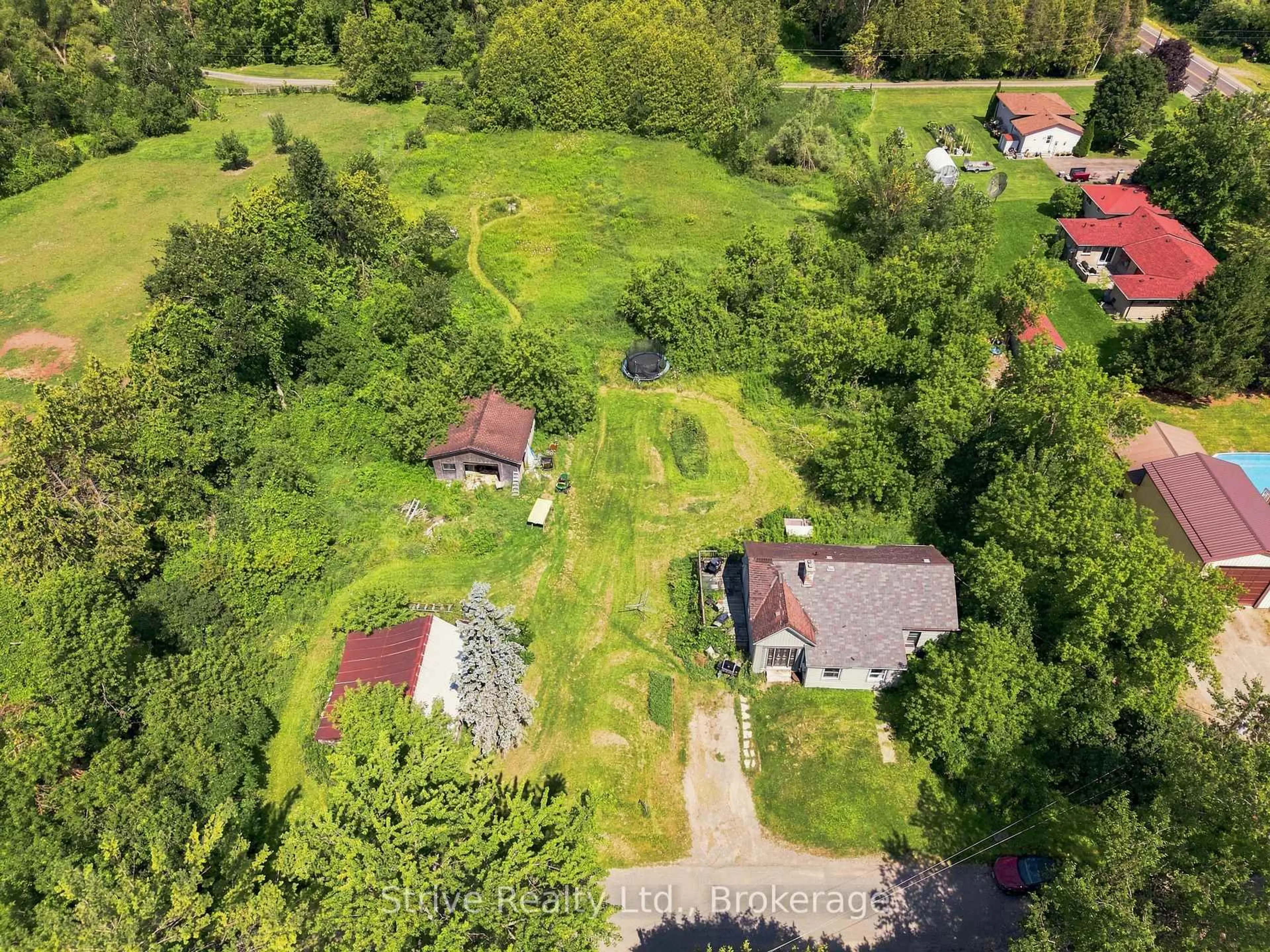 A pic from outside/outdoor area/front of a property/back of a property/a pic from drone, street for 916 King George St, Cavan Monaghan Ontario L0A 1C0