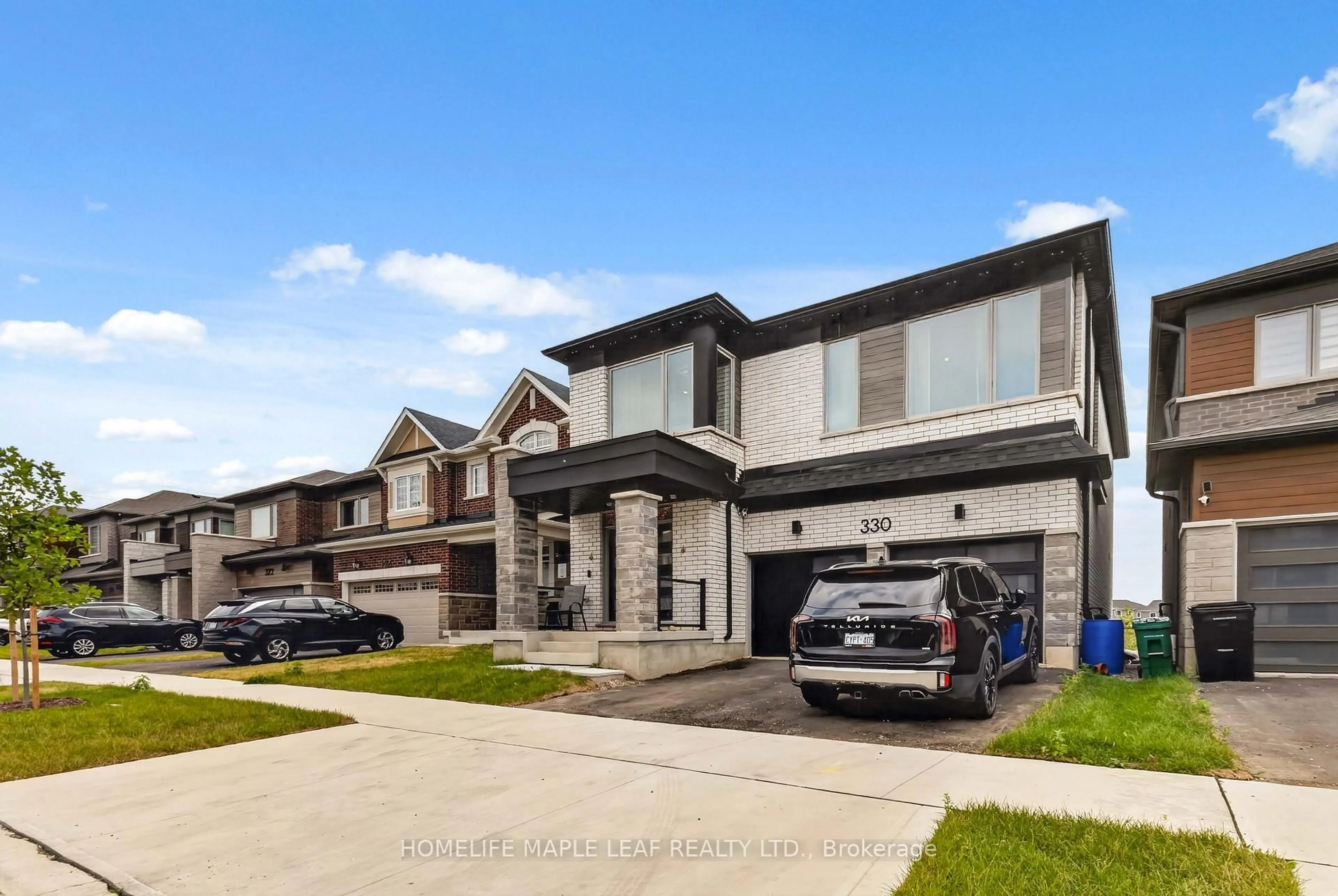 Home with brick exterior material, street for 330 Millstone St, Kitchener Ontario N2R 0S9