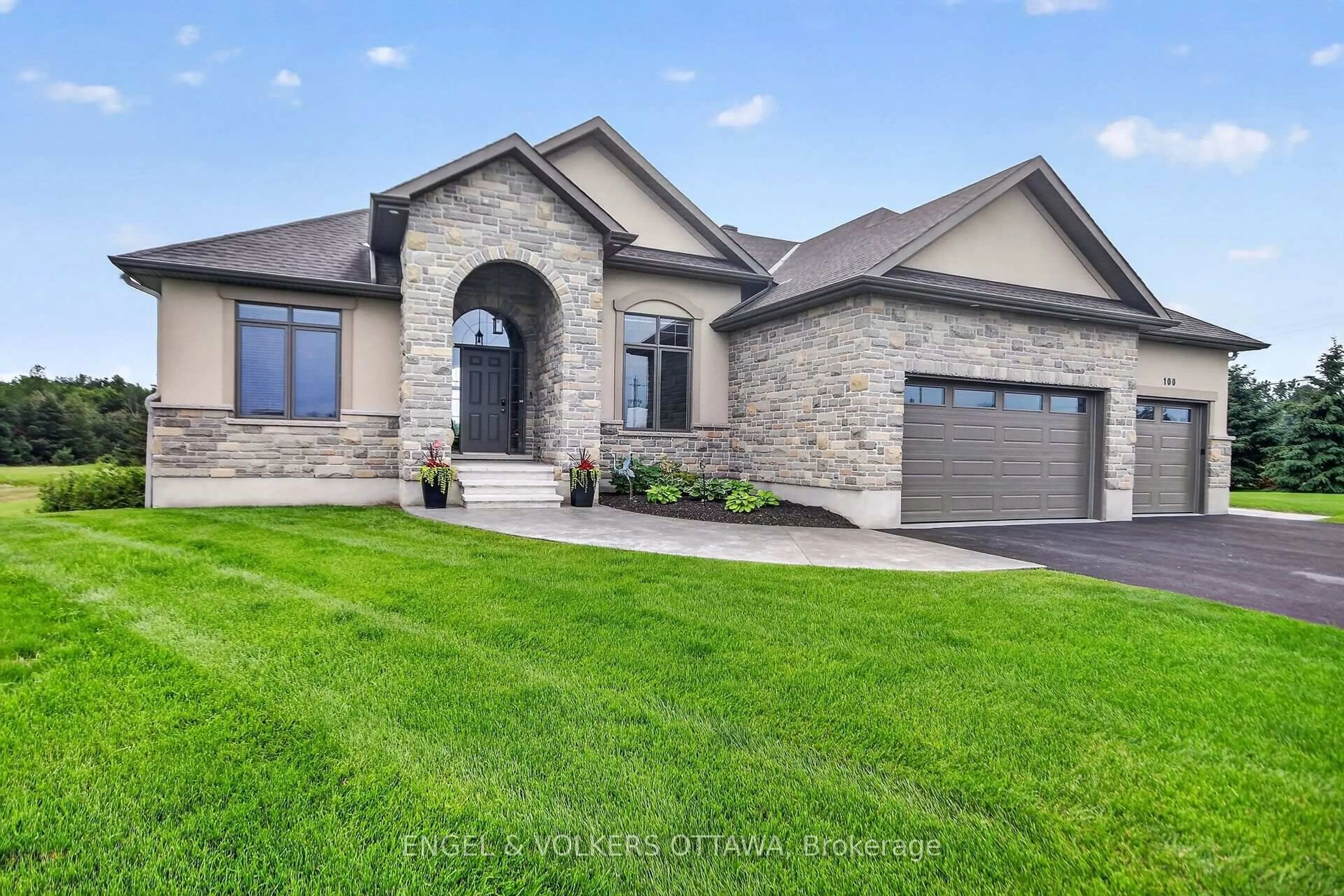 Home with brick exterior material, street for 100 Lake Trail Rd, Greely Ontario K4P 2G2