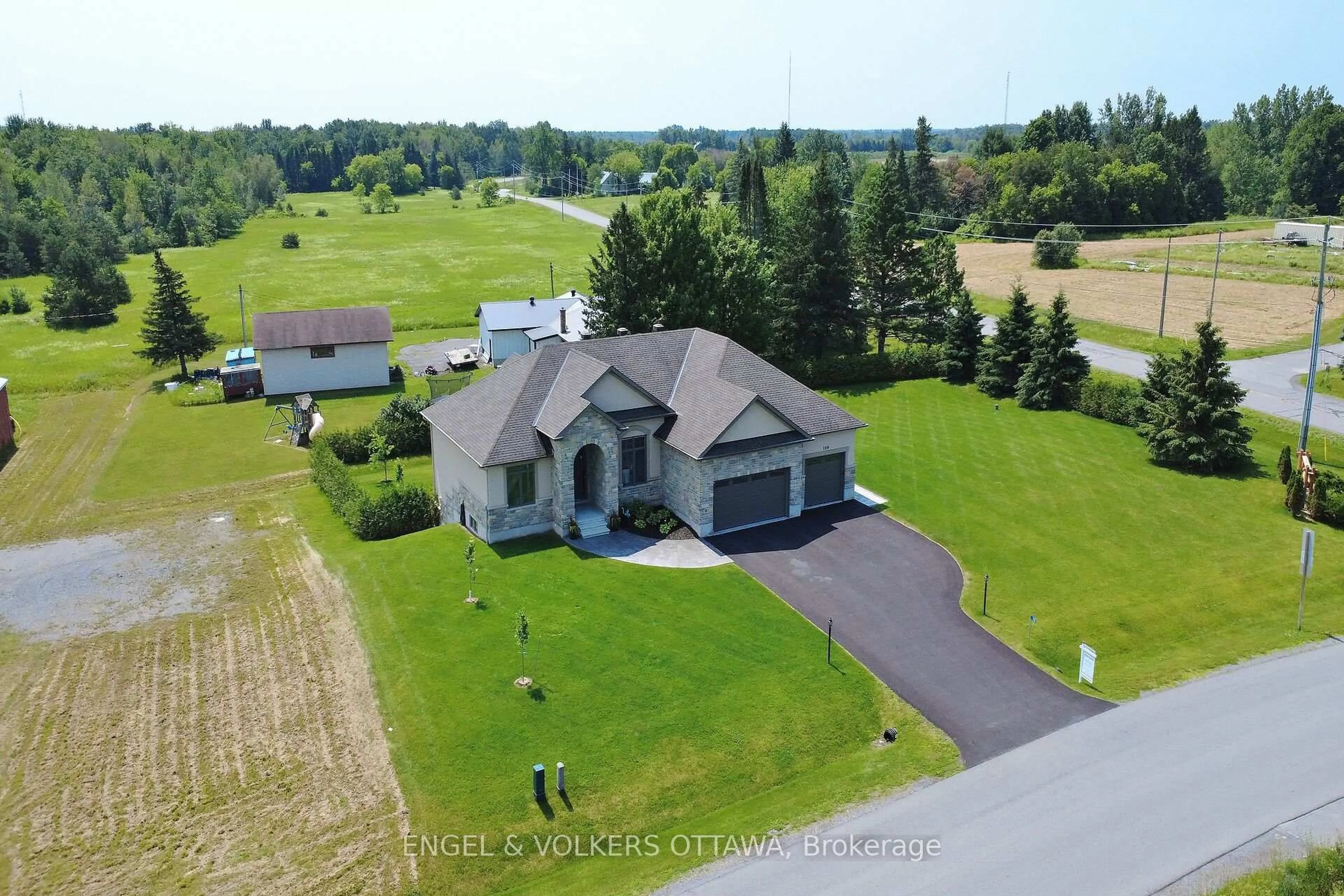 A pic from outside/outdoor area/front of a property/back of a property/a pic from drone, water/lake/river/ocean view for 100 Lake Trail Rd, Greely Ontario K4P 2G2