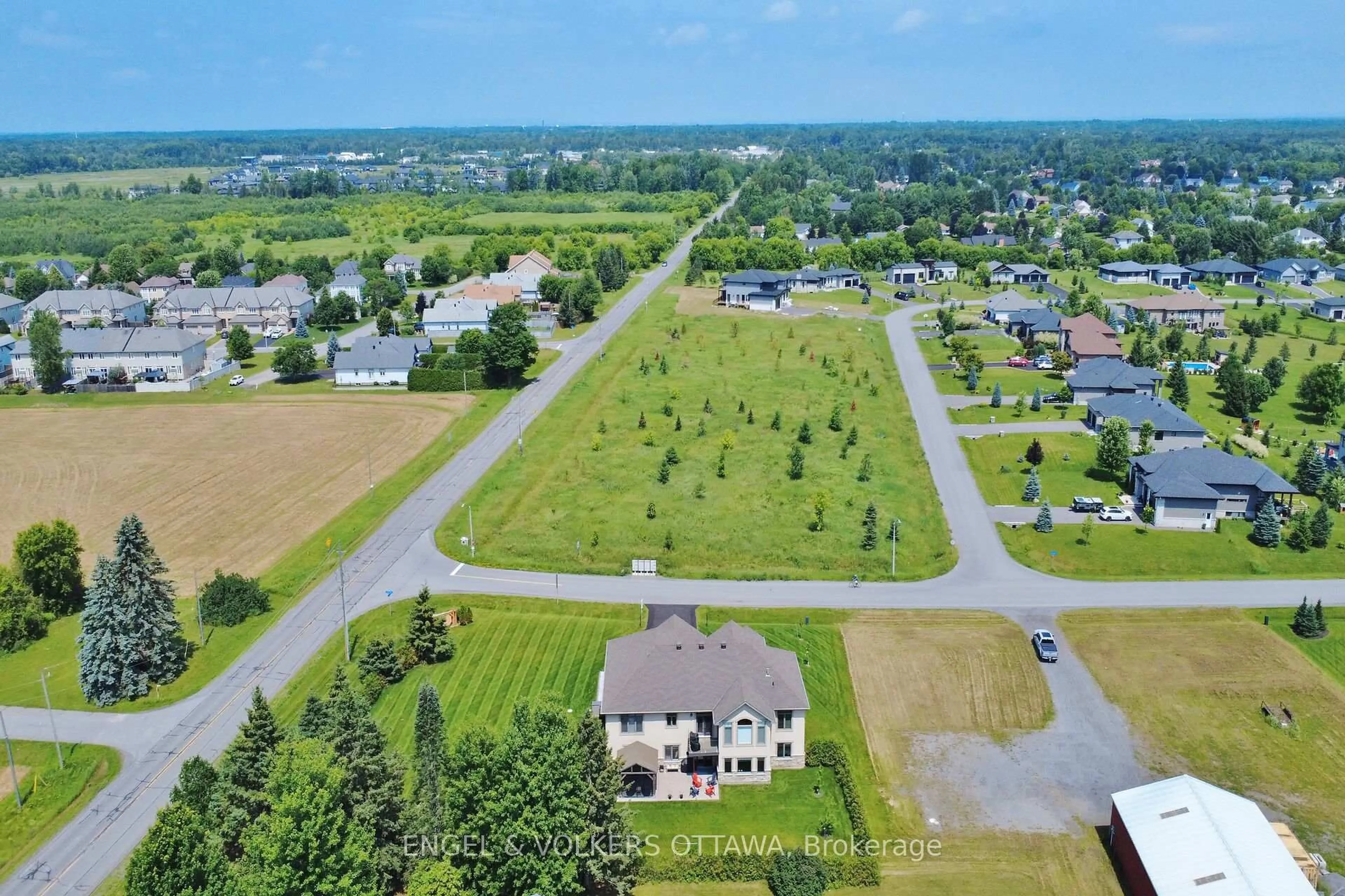 A pic from outside/outdoor area/front of a property/back of a property/a pic from drone, unknown for 100 Lake Trail Rd, Greely Ontario K4P 2G2