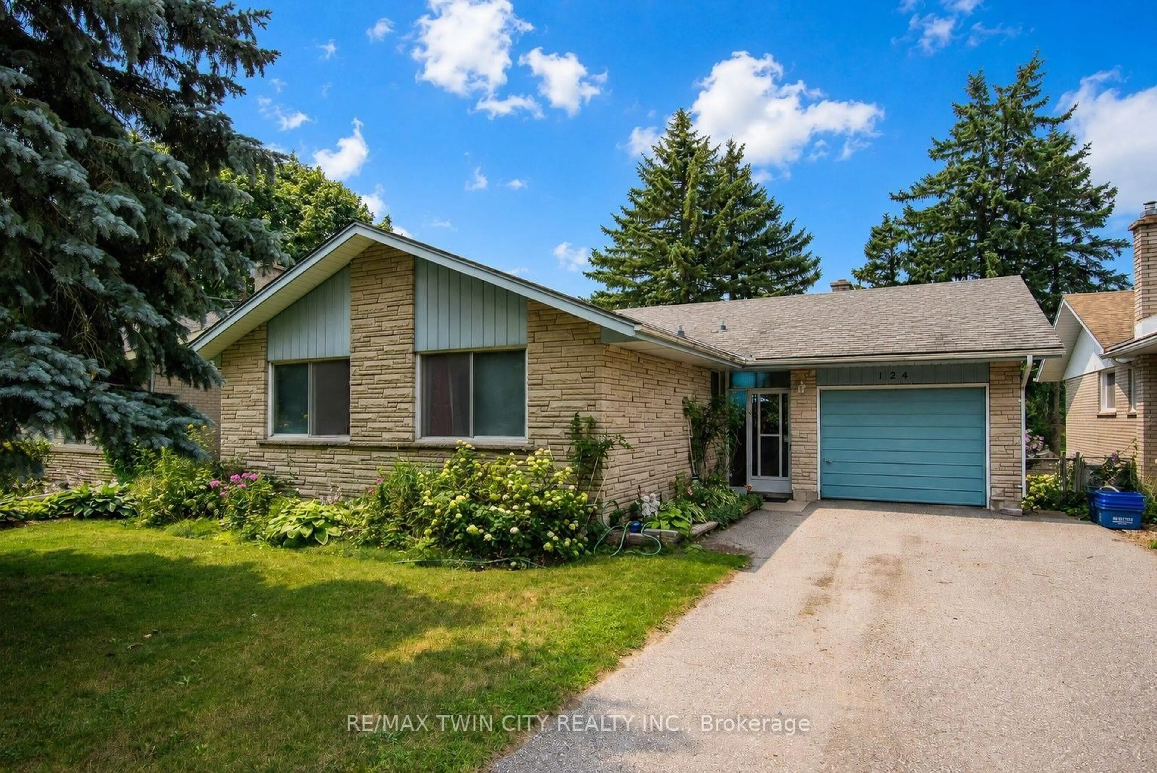 Home with brick exterior material, street for 124 Carwood Ave, Kitchener Ontario N2G 3B9